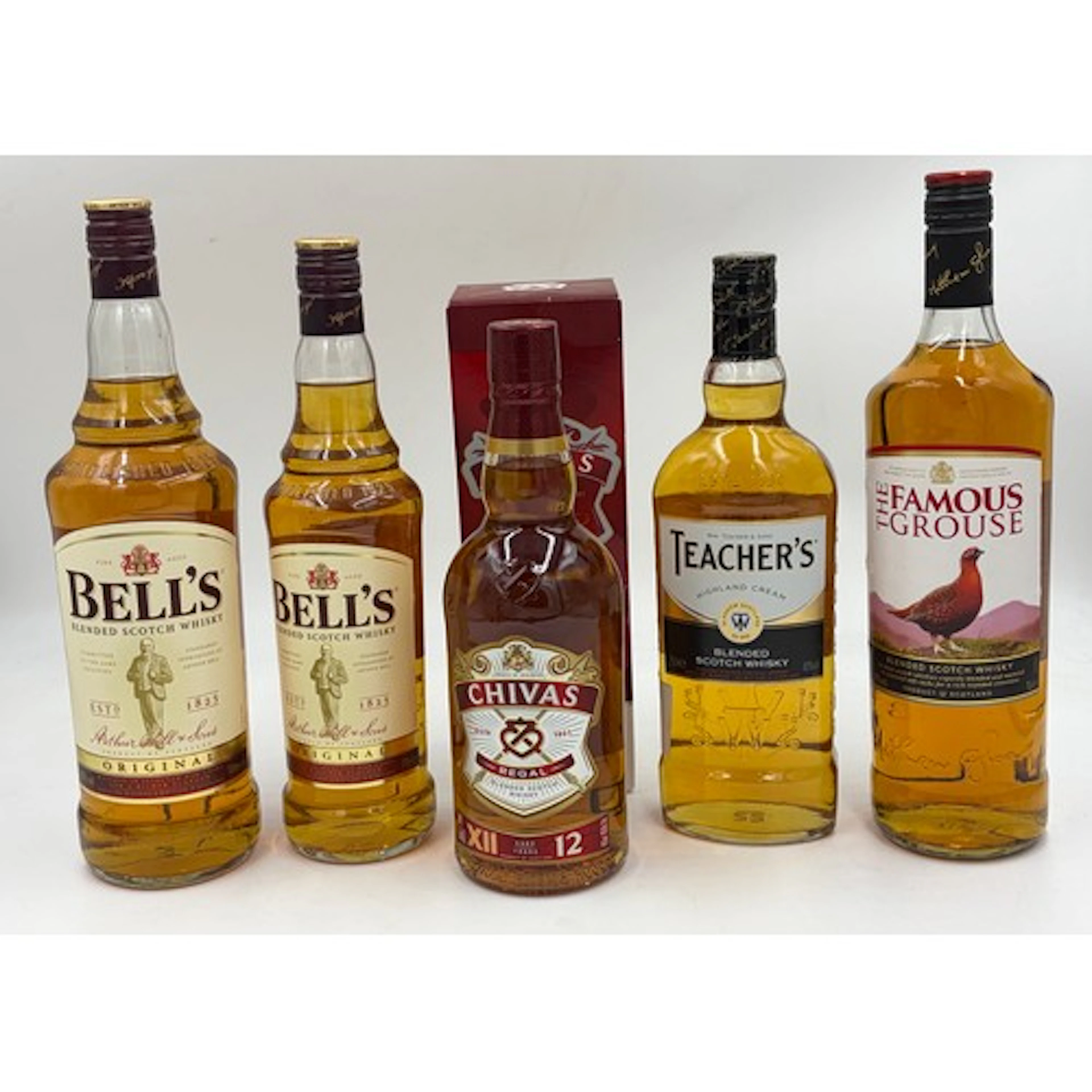 A collection of Whisky to include Chivas Regal 70cl in box, ...