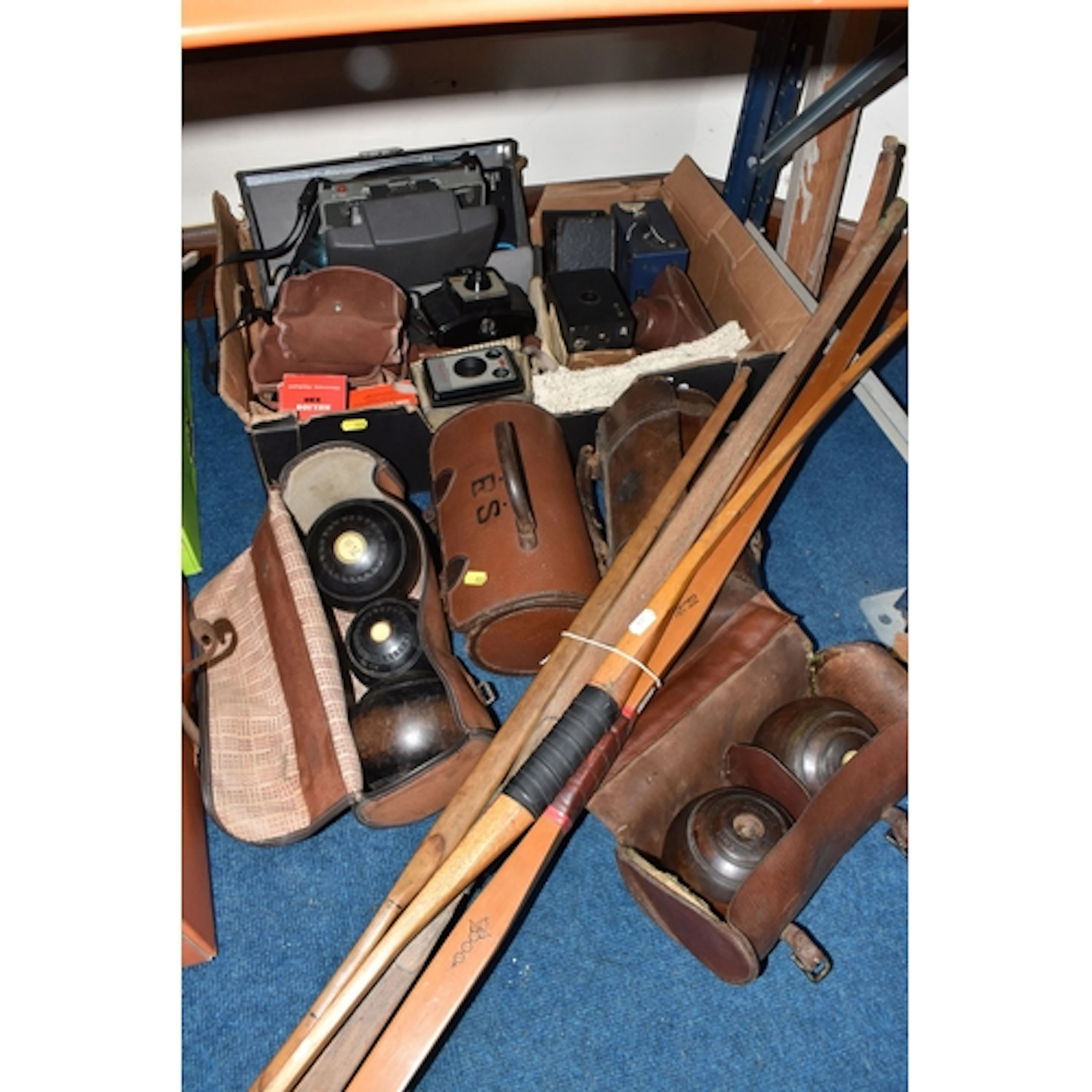 A BOX OF VINTAGE CAMERAS, ARCHERY BOWS AND BOWLING BALLS com...