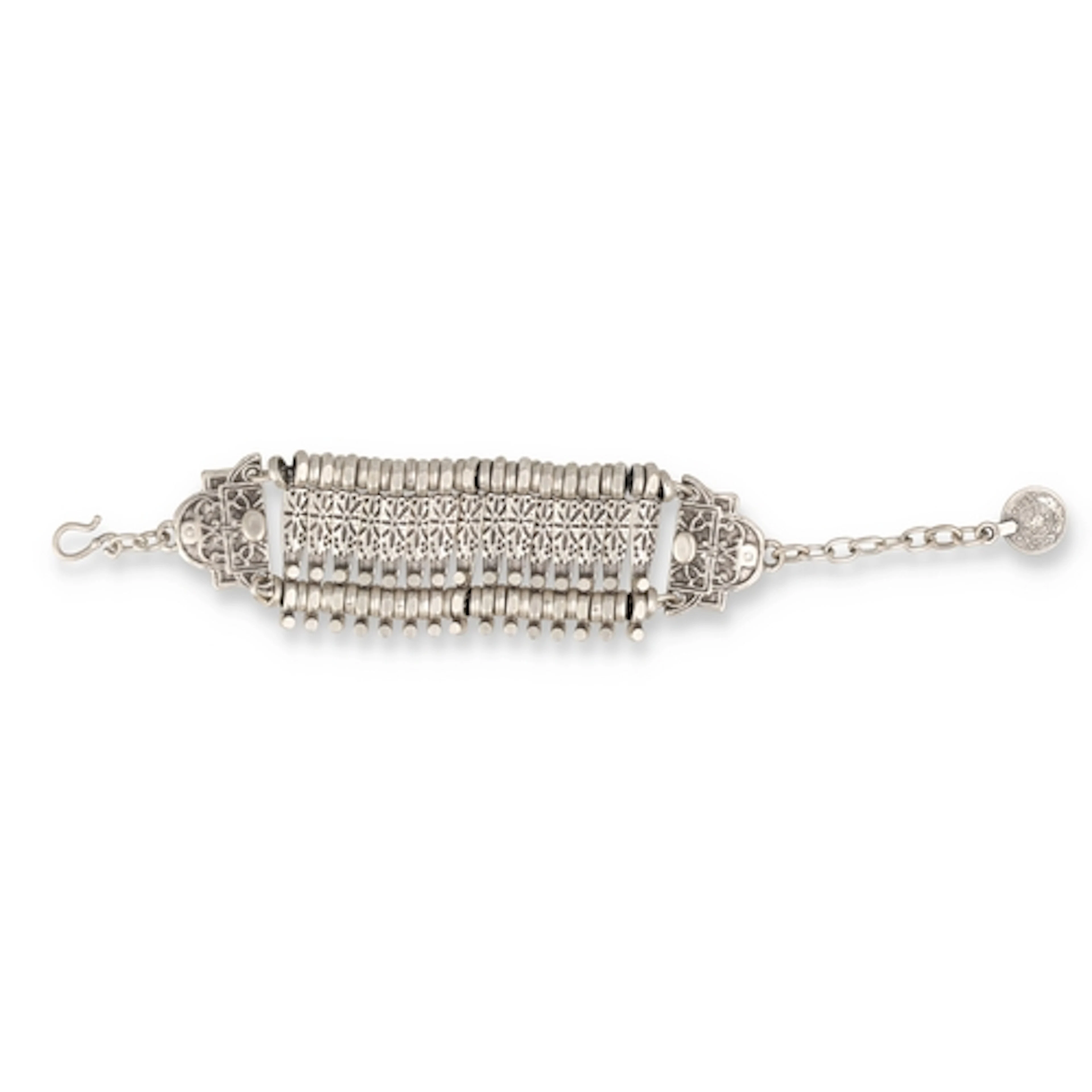 A 20TH C INDIAN OR MIDDLE EASTERN SILVER BRACELET WITH ATTAC...