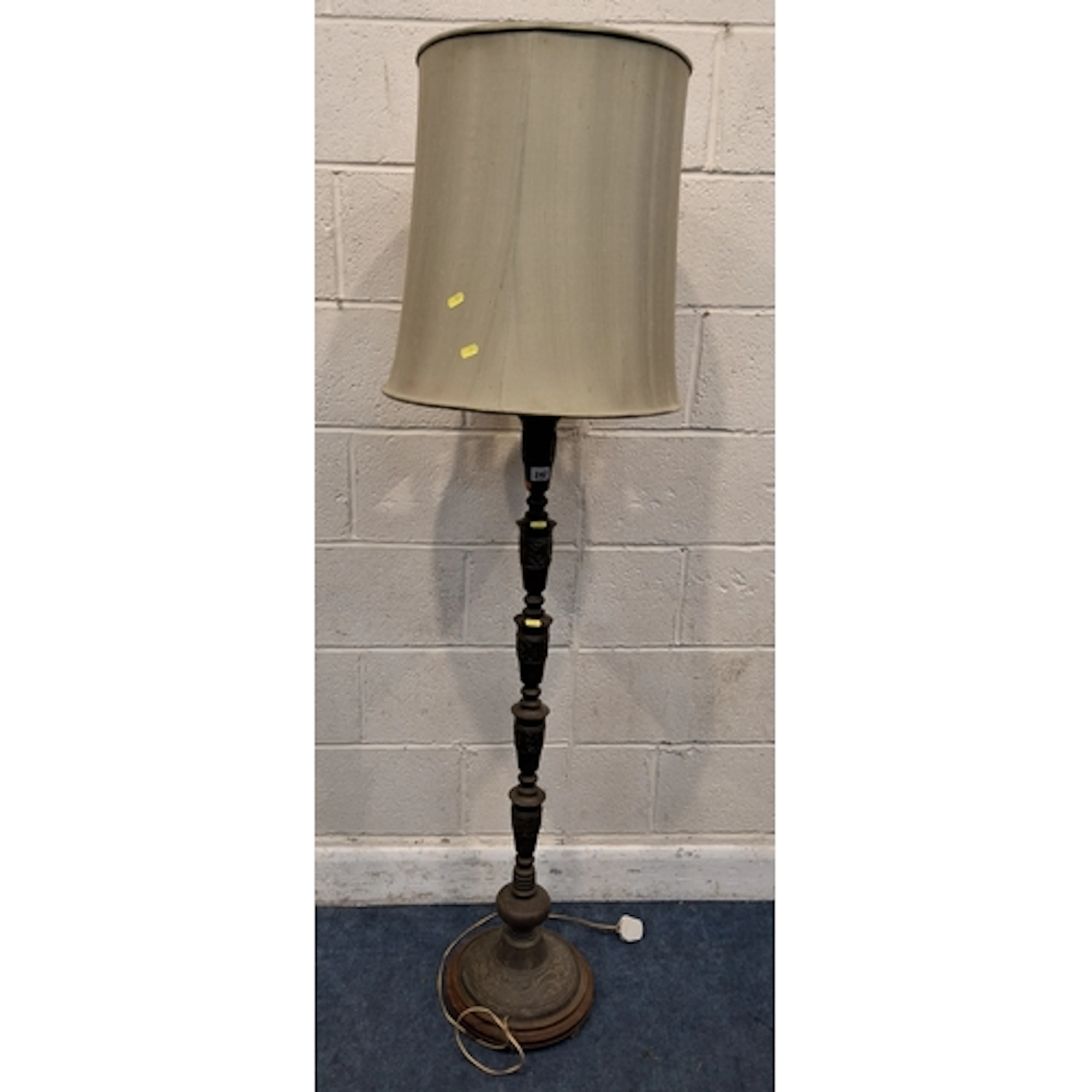 A BRASS TELESCOPIC STANDARD LAMP, with various mythical crea...