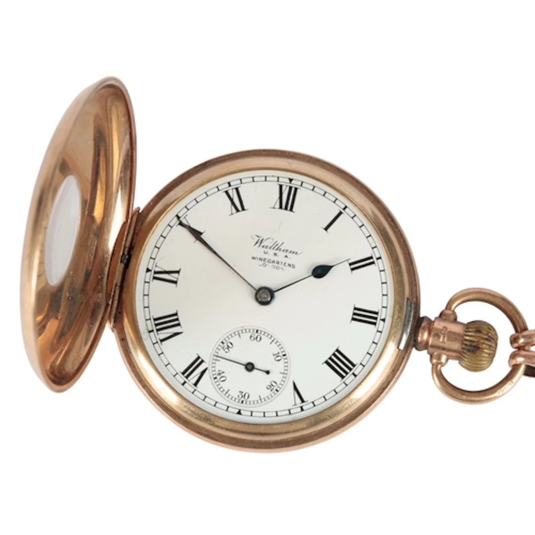 A George V 9ct gold Waltham half hunter keyless pocket watch...