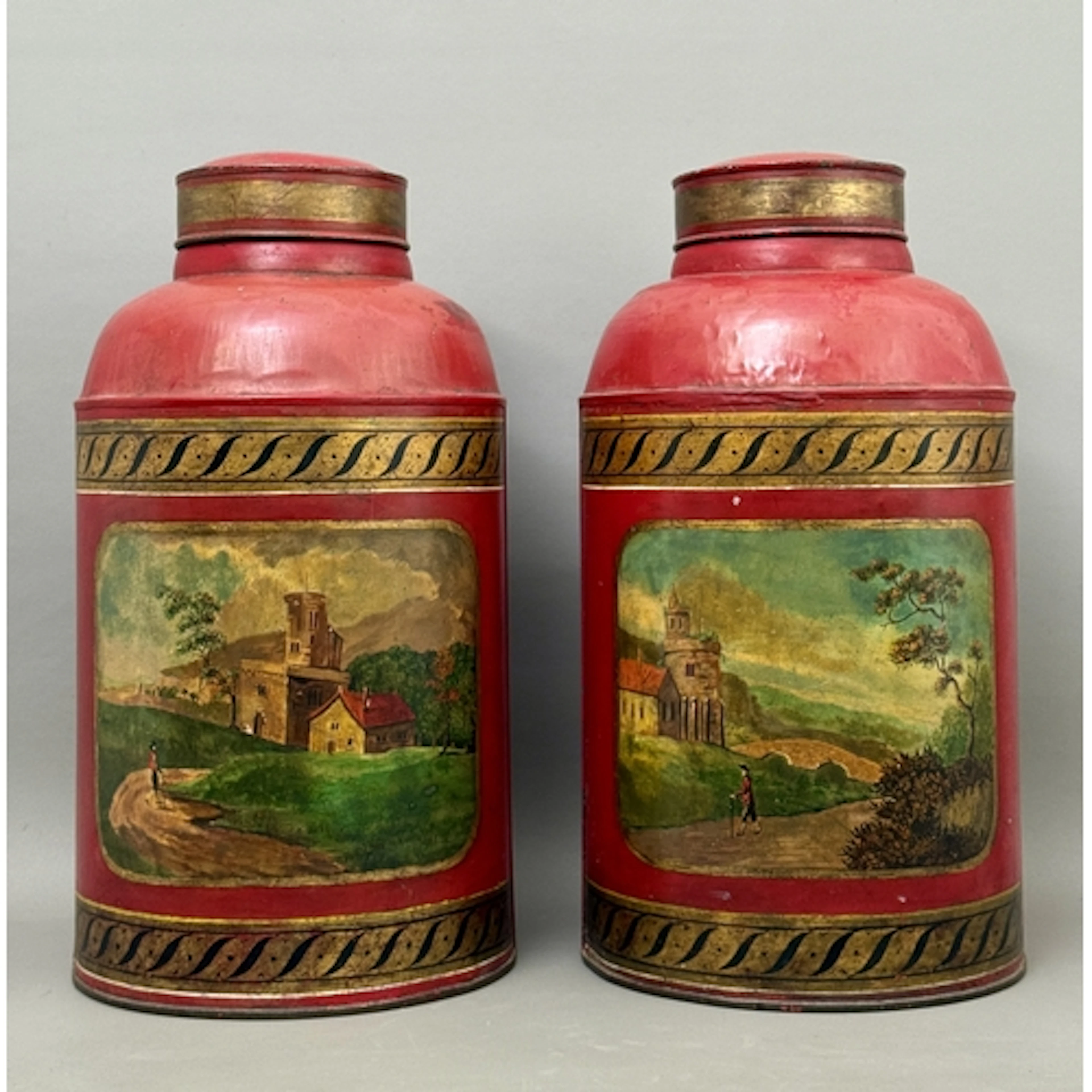 A pair of large antique toleware painted tea canisters - 19t...