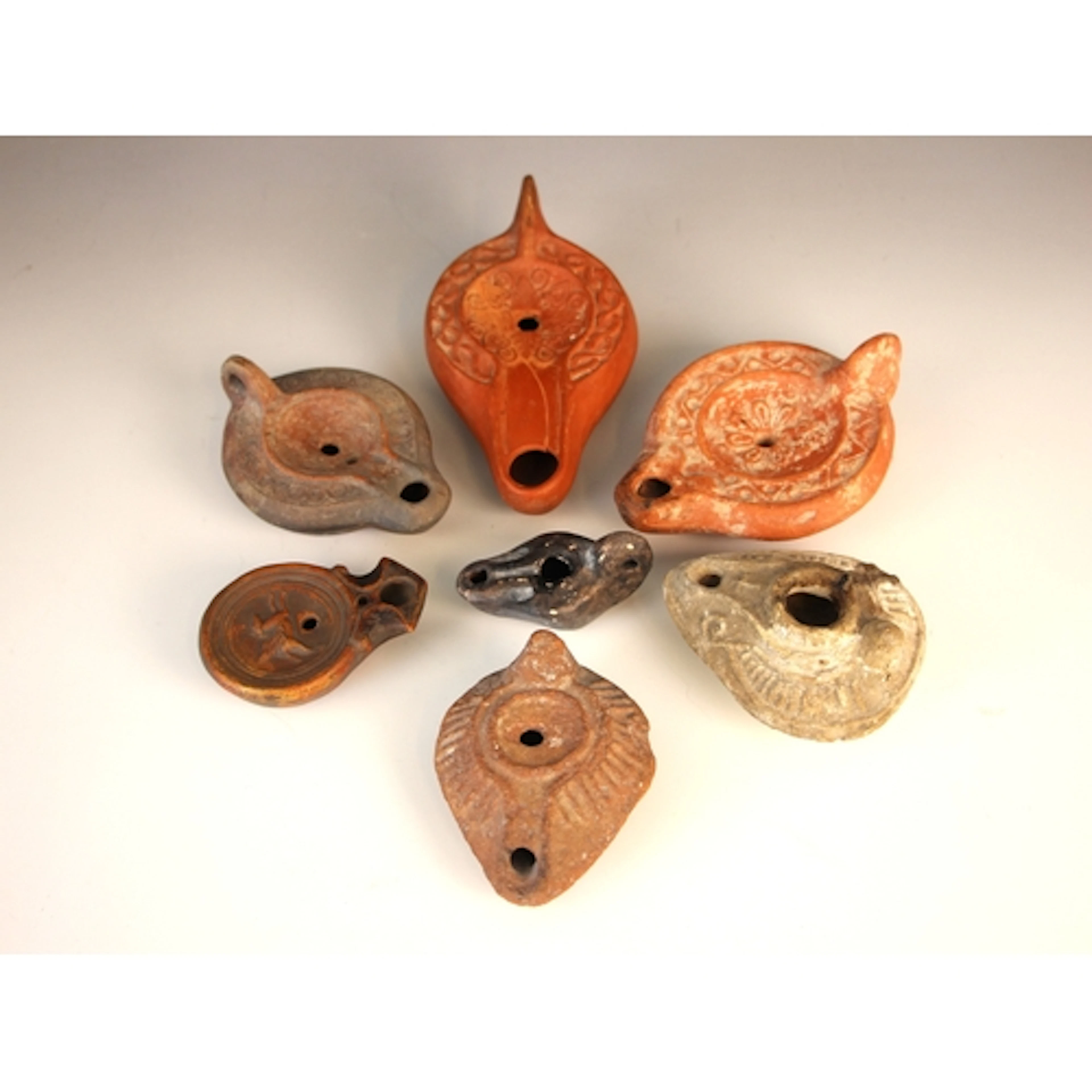 A Roman terracotta oil lamp, probably first to fourth centur...