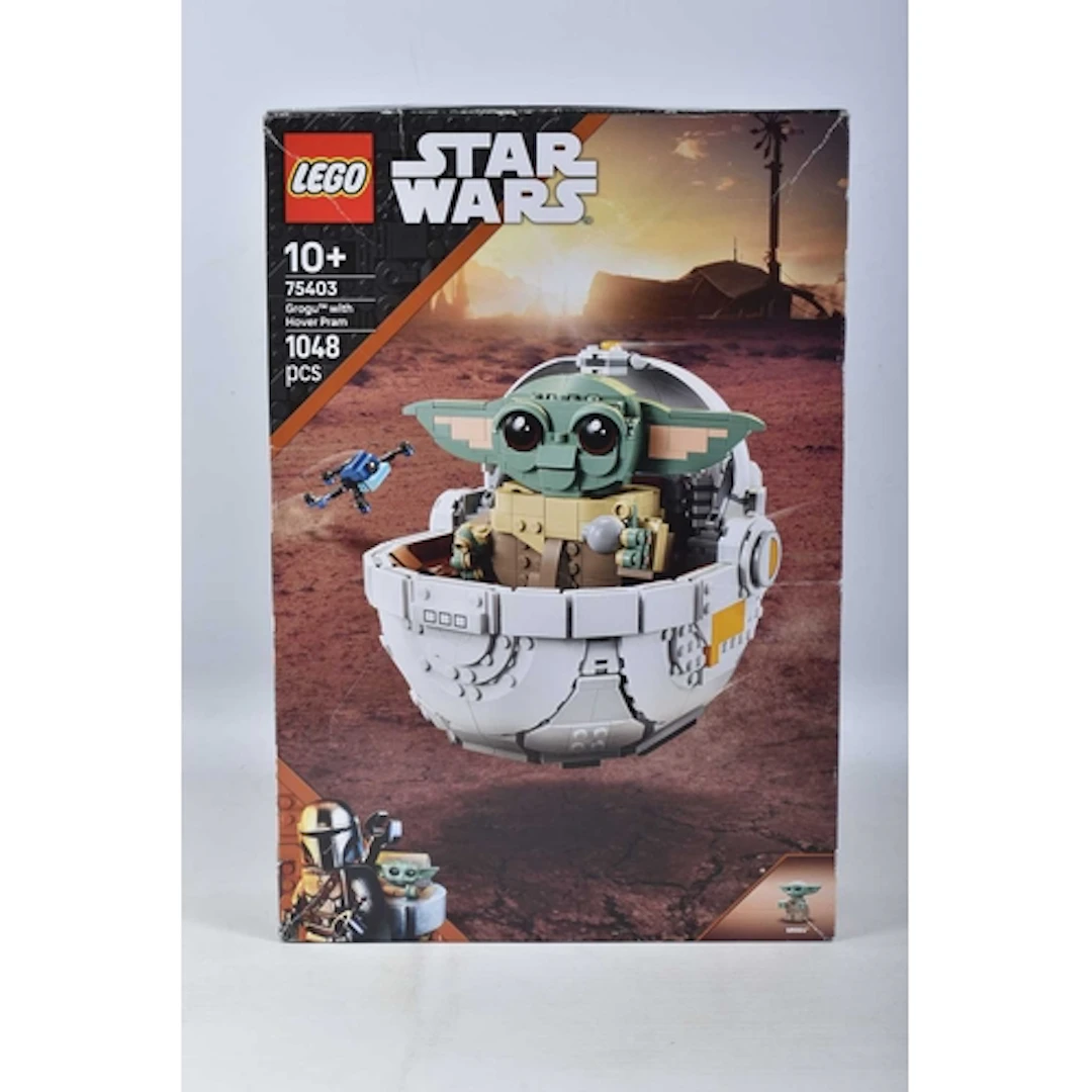 A BOXED SEALED STAR WARS MANDALORIAN GROGU WITH HOVER PRAM, ...
