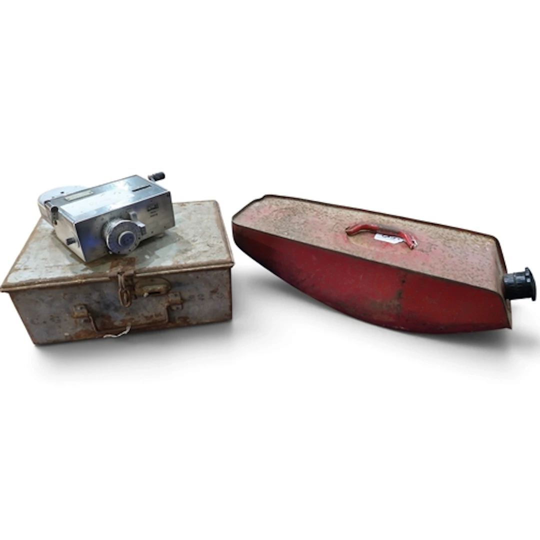 Automobilia - a vintage red-painted Volvo fuel can, together...