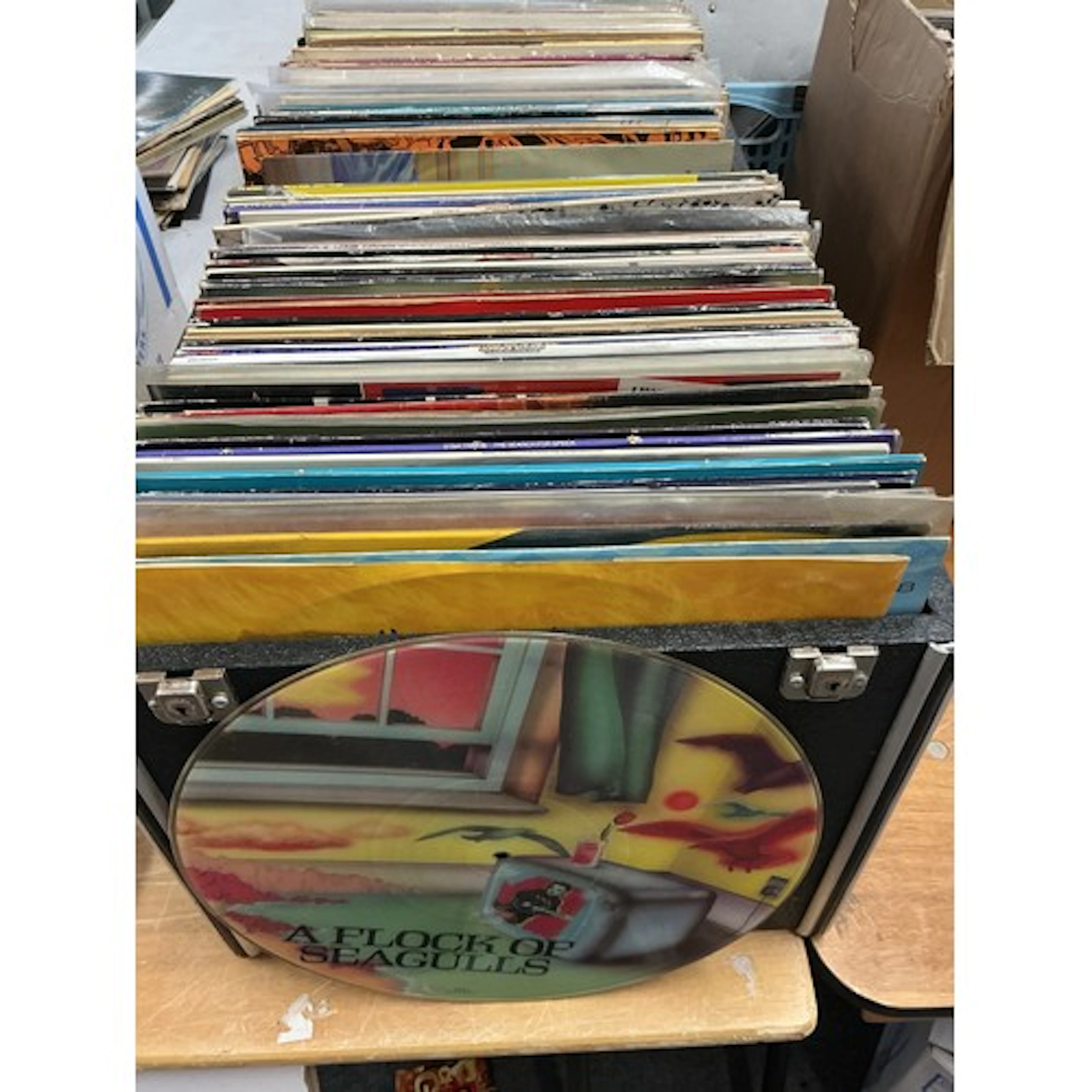 Two boxes of 12” singles and LPs by various artists includin...