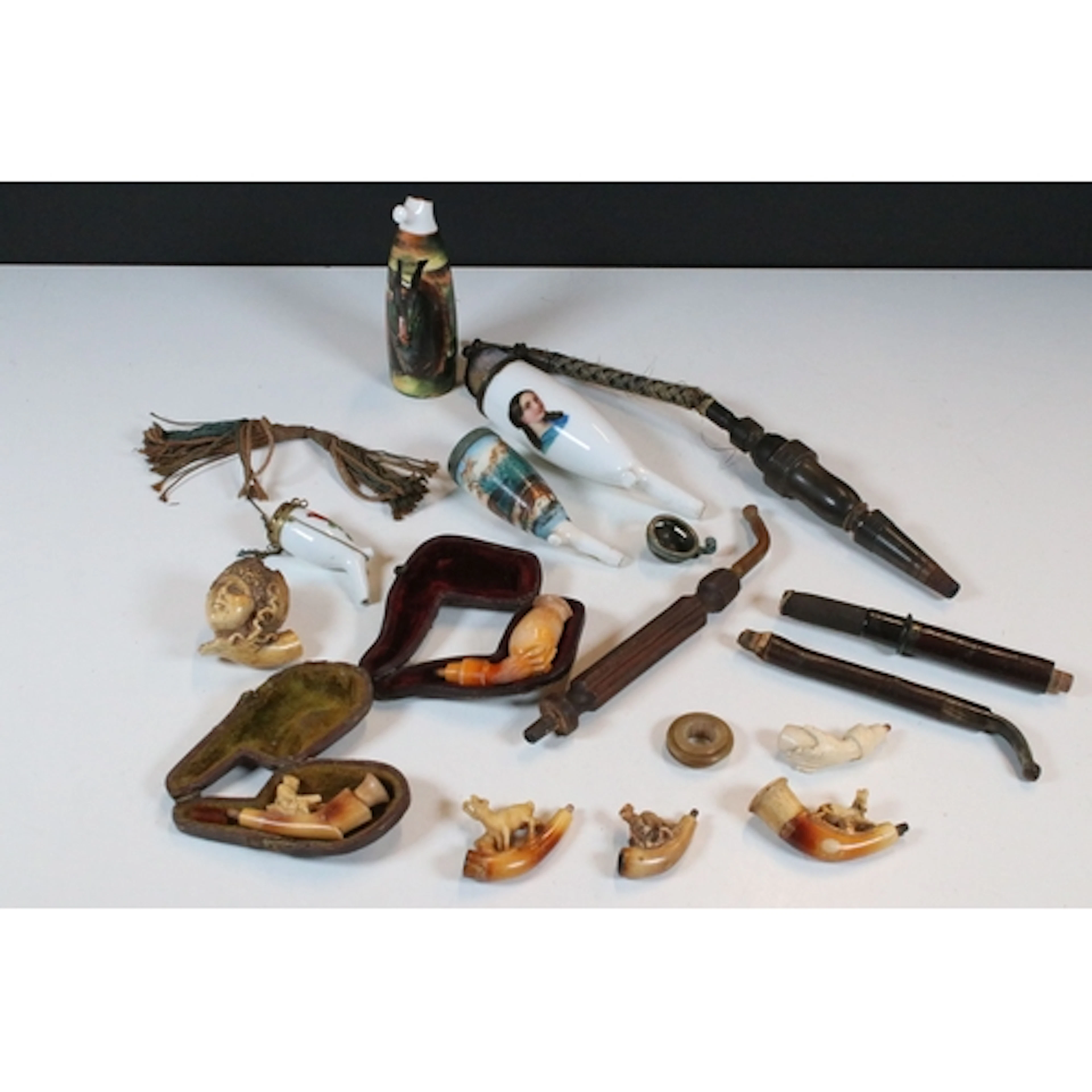 Smoking paraphernalia to include ceramic tobacco pipe bowls,...