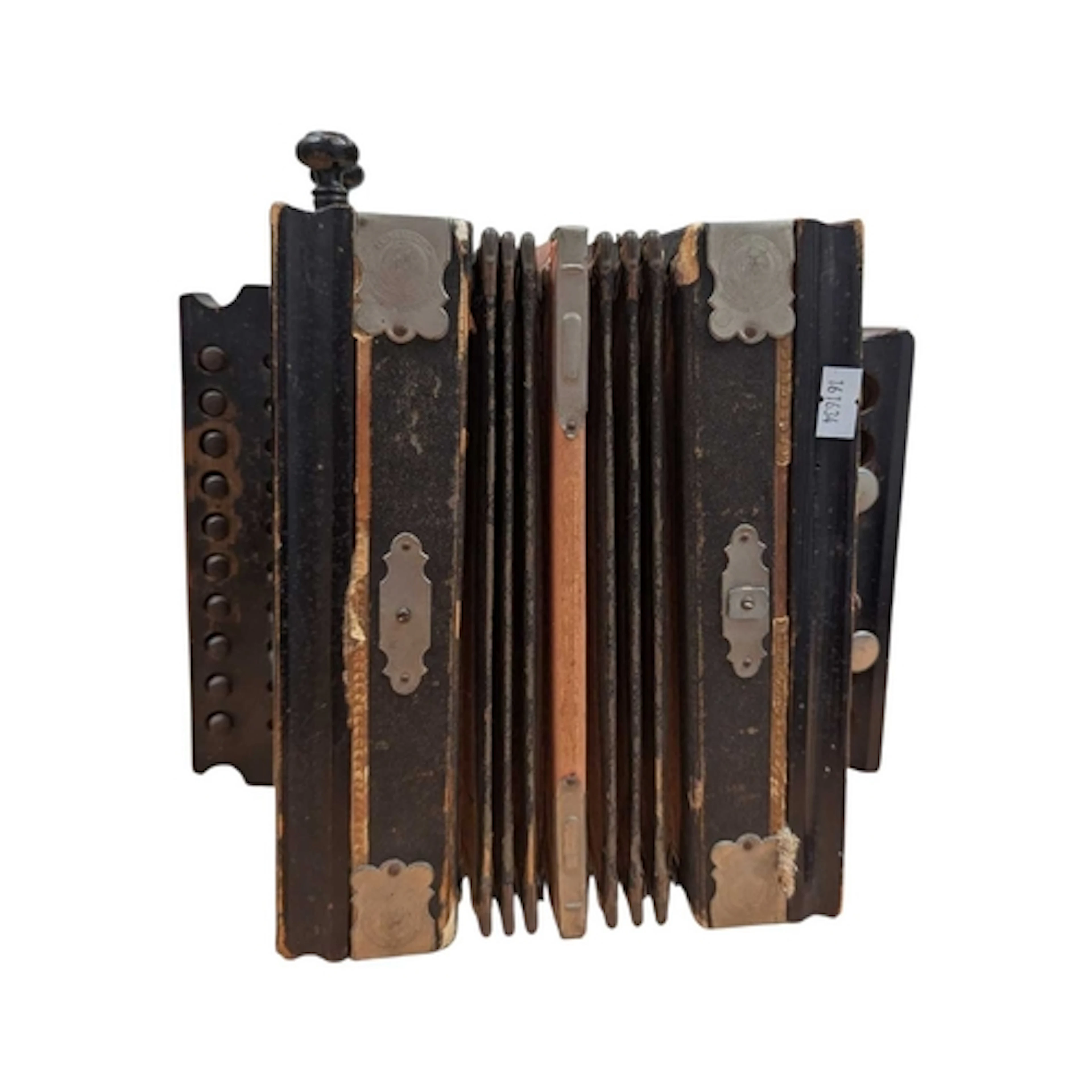 A 19th century 'The Victor' German squeeze box accordion. Ma...