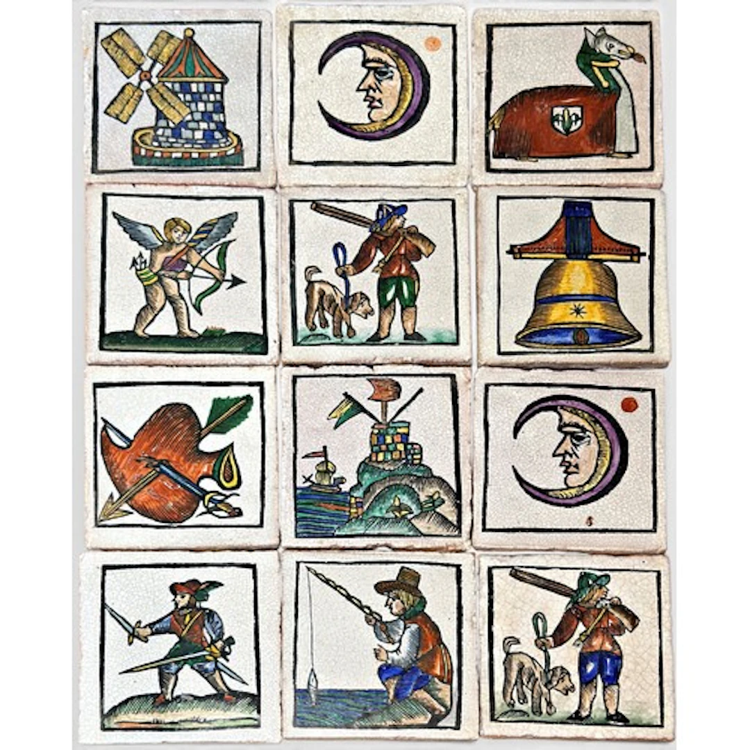 A decorative run of twelve large glazed stoneware tiles, eac...