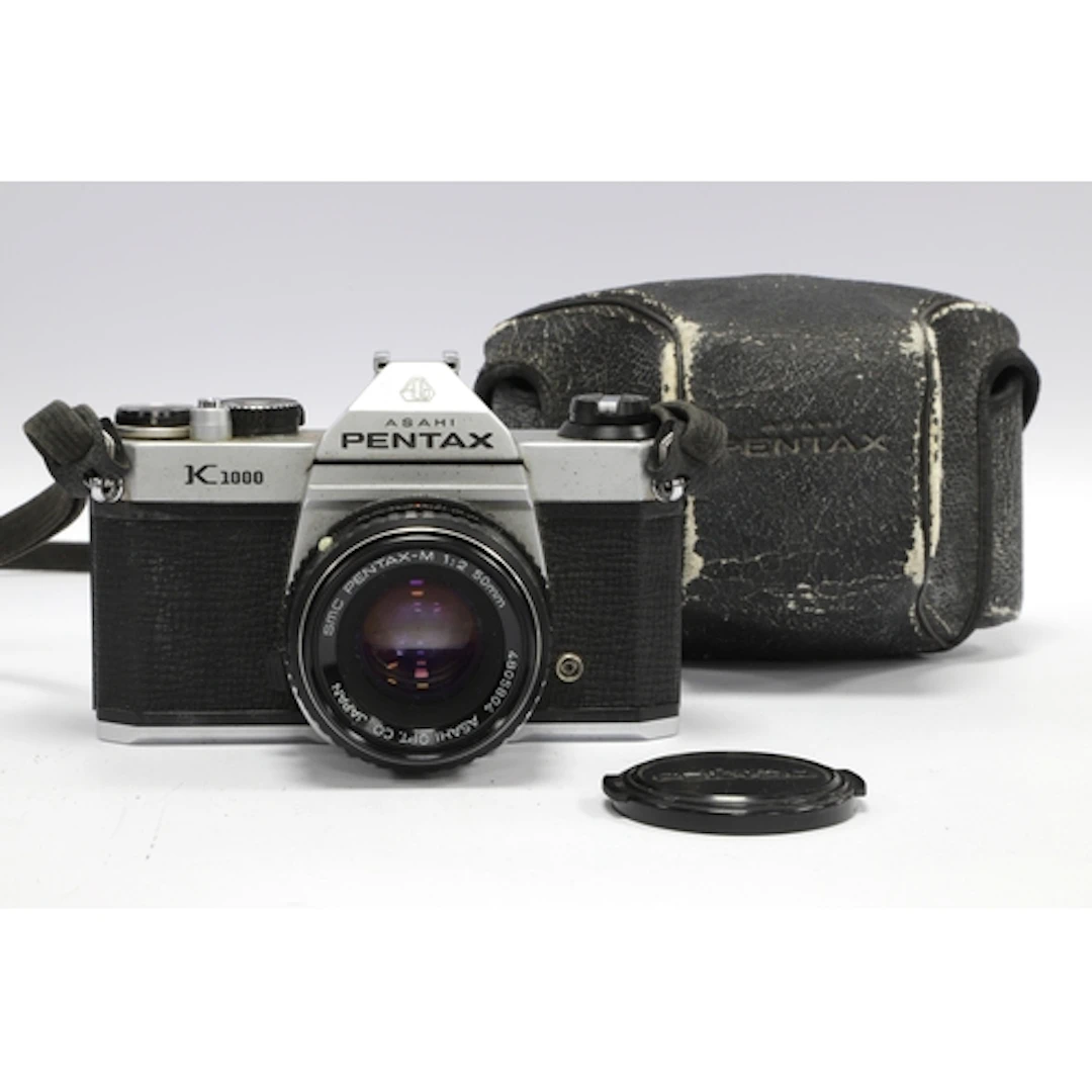 Asahi Pentax K1000 35mm SLR Film Camera with attached SMC Pe...