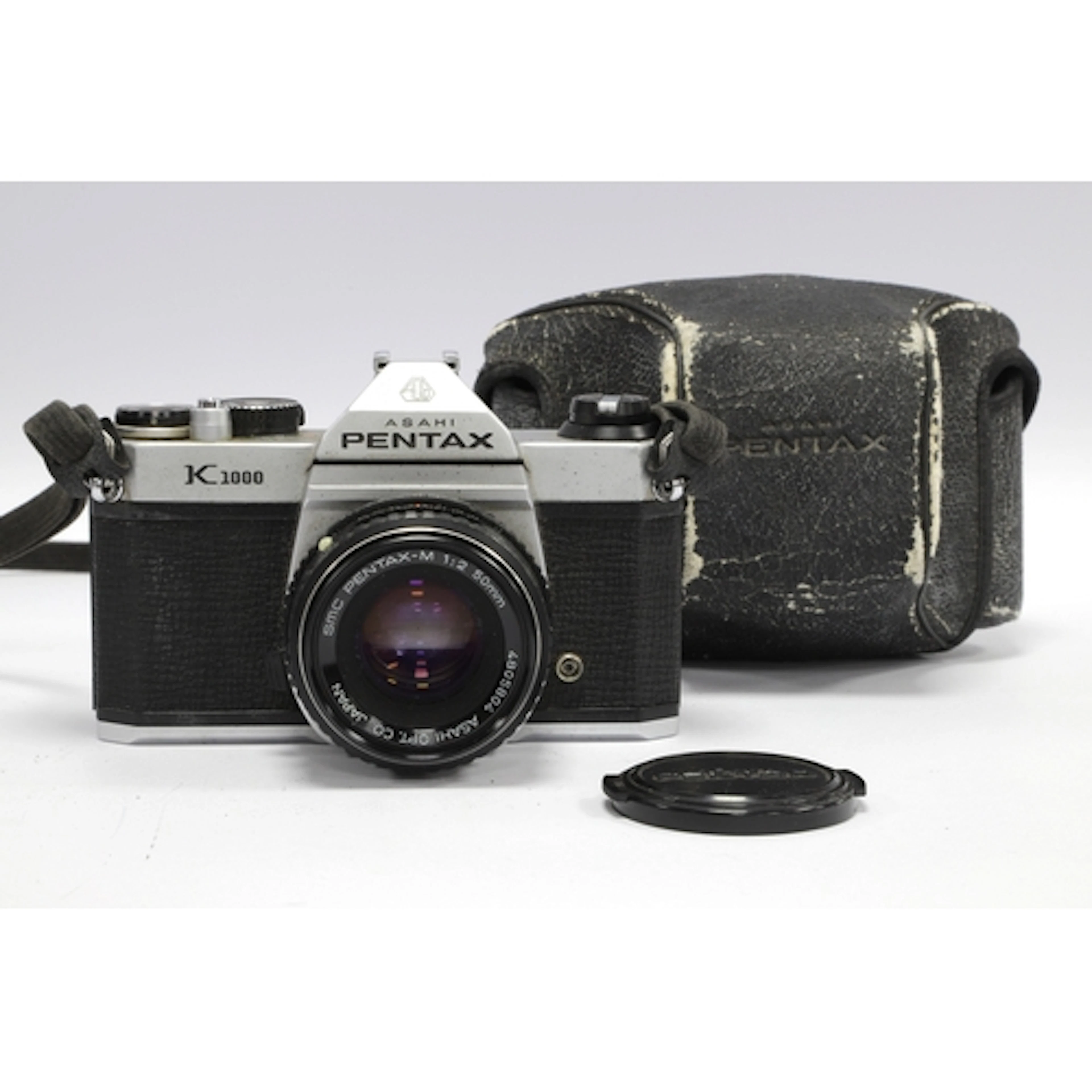 Asahi Pentax K1000 35mm SLR Film Camera with attached SMC Pe...
