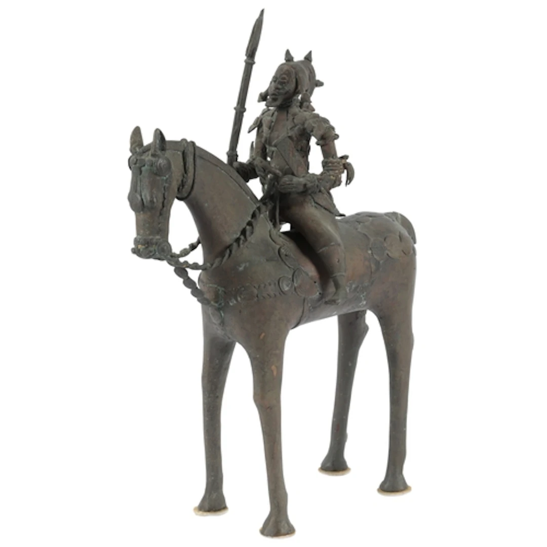 A large brass model of a Portuguese soldier on a horse, Nige...