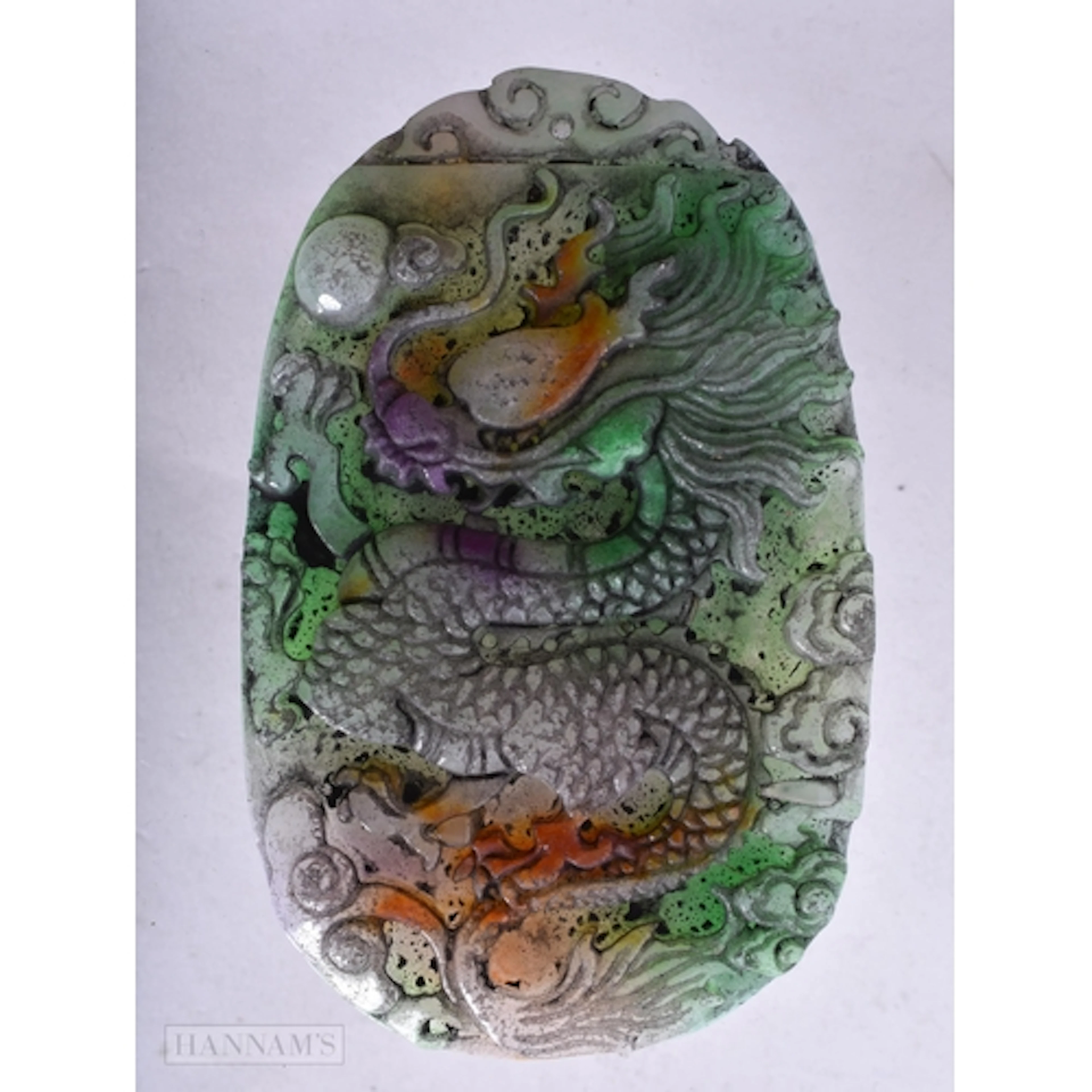 A CARVED GREEN DRAGON PENDANT. 1.1 x 9.1 x 5.7 cm. 94.4 gram...