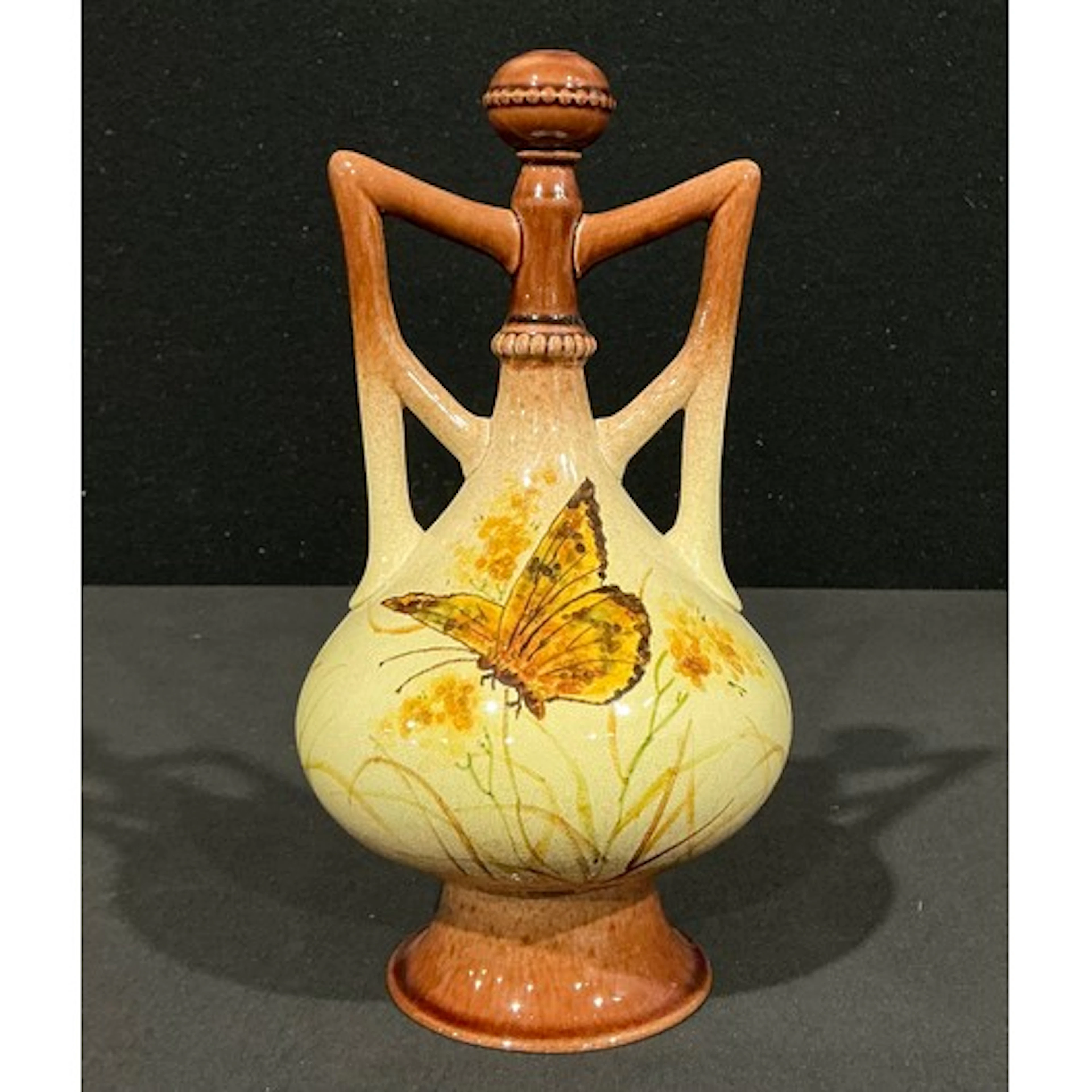 An Ault Pottery two handled bottle vase, designed by Christo...