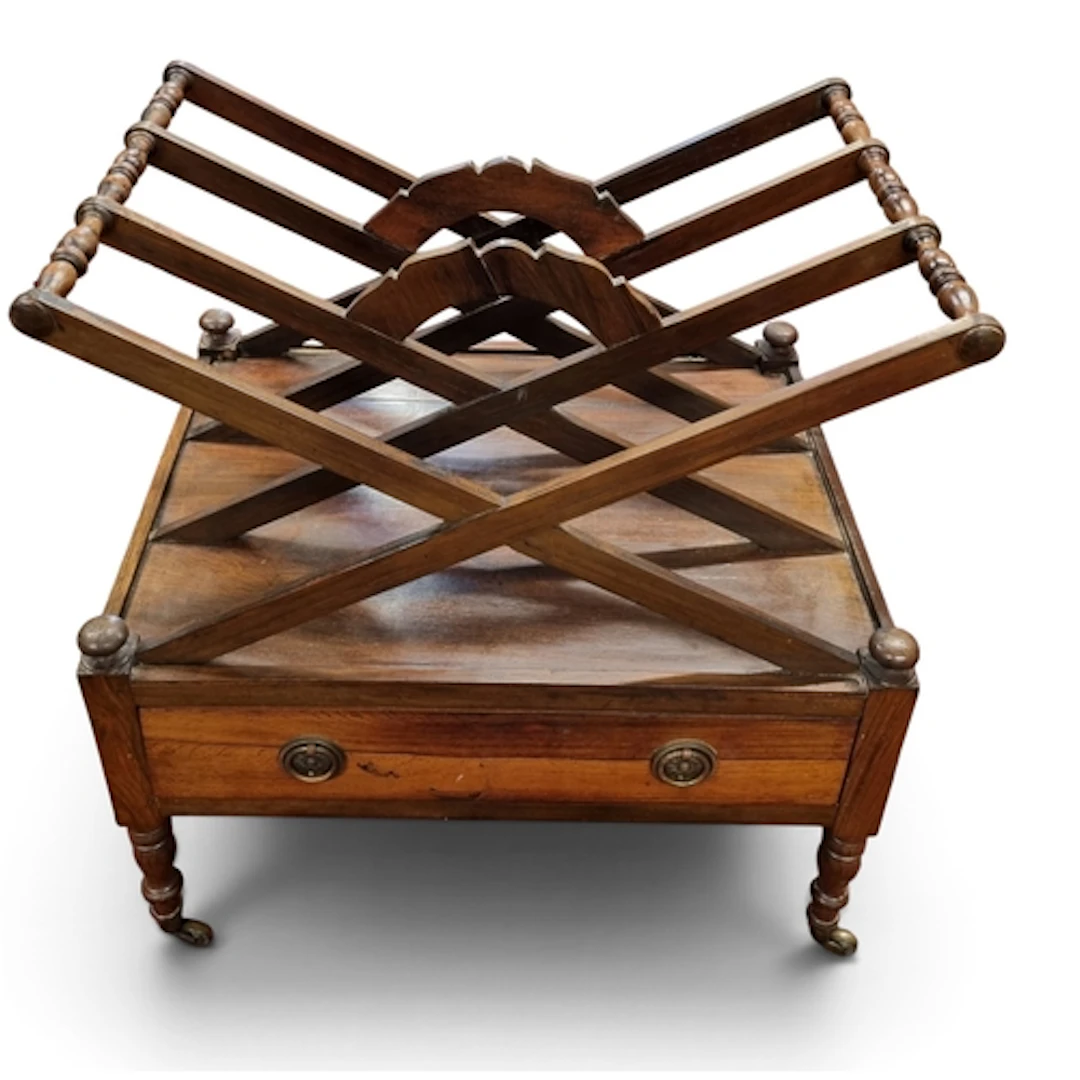 A late 19th early 20th Century Rosewood Canterbury on turned...