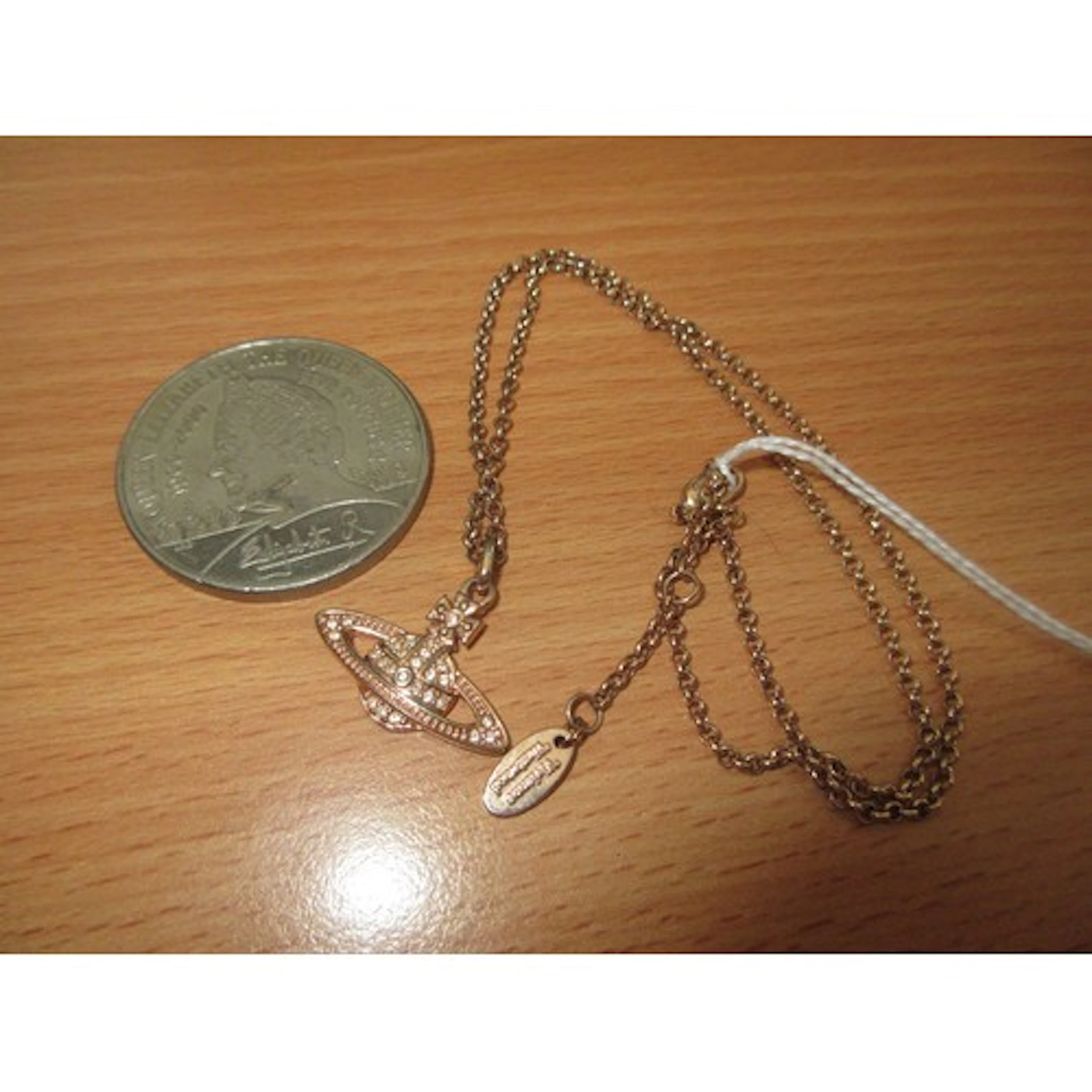 Vivienne Westwood Necklace and a £5 Coin