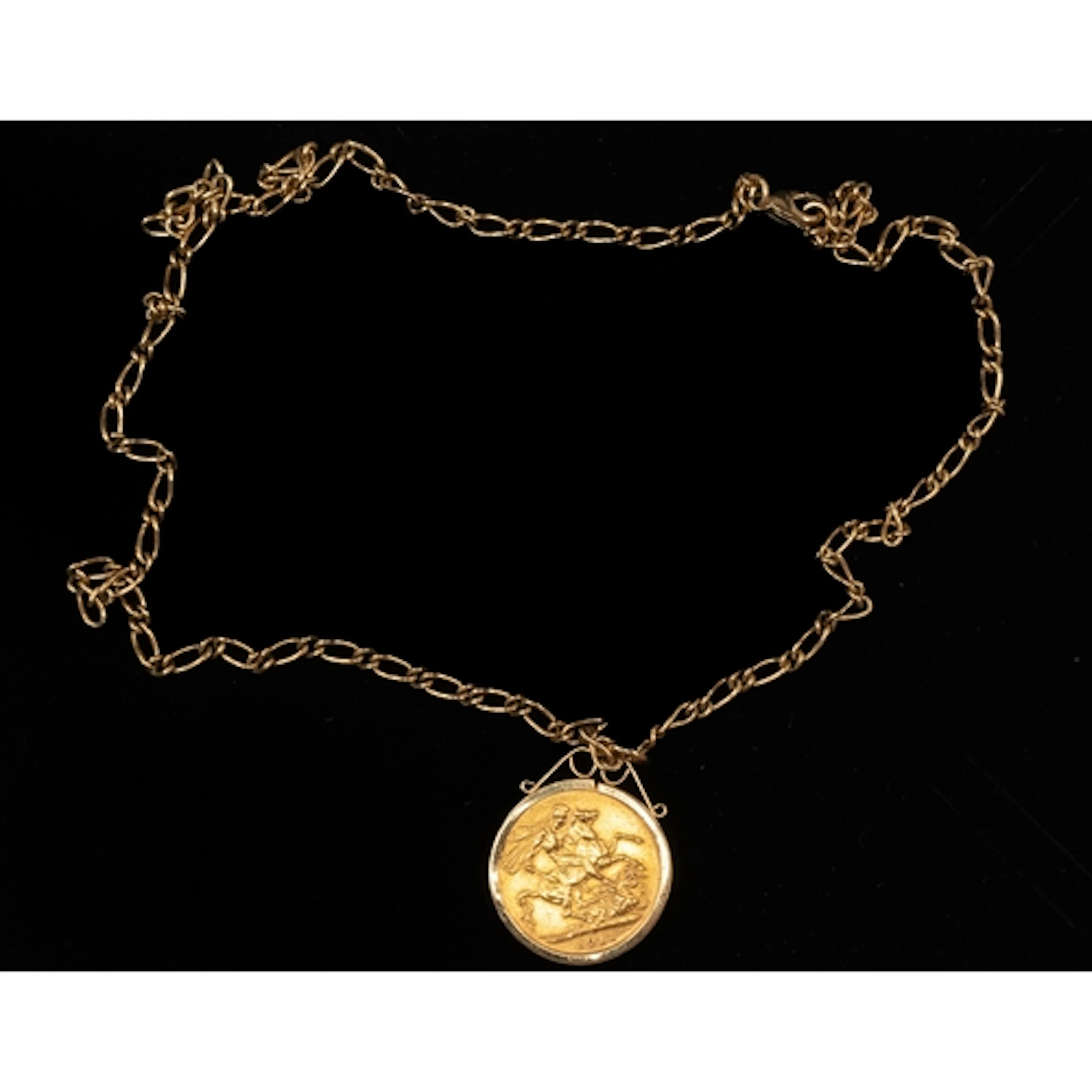 Jewellery: a 1911 George V full sovereign in 9ct gold mount,...