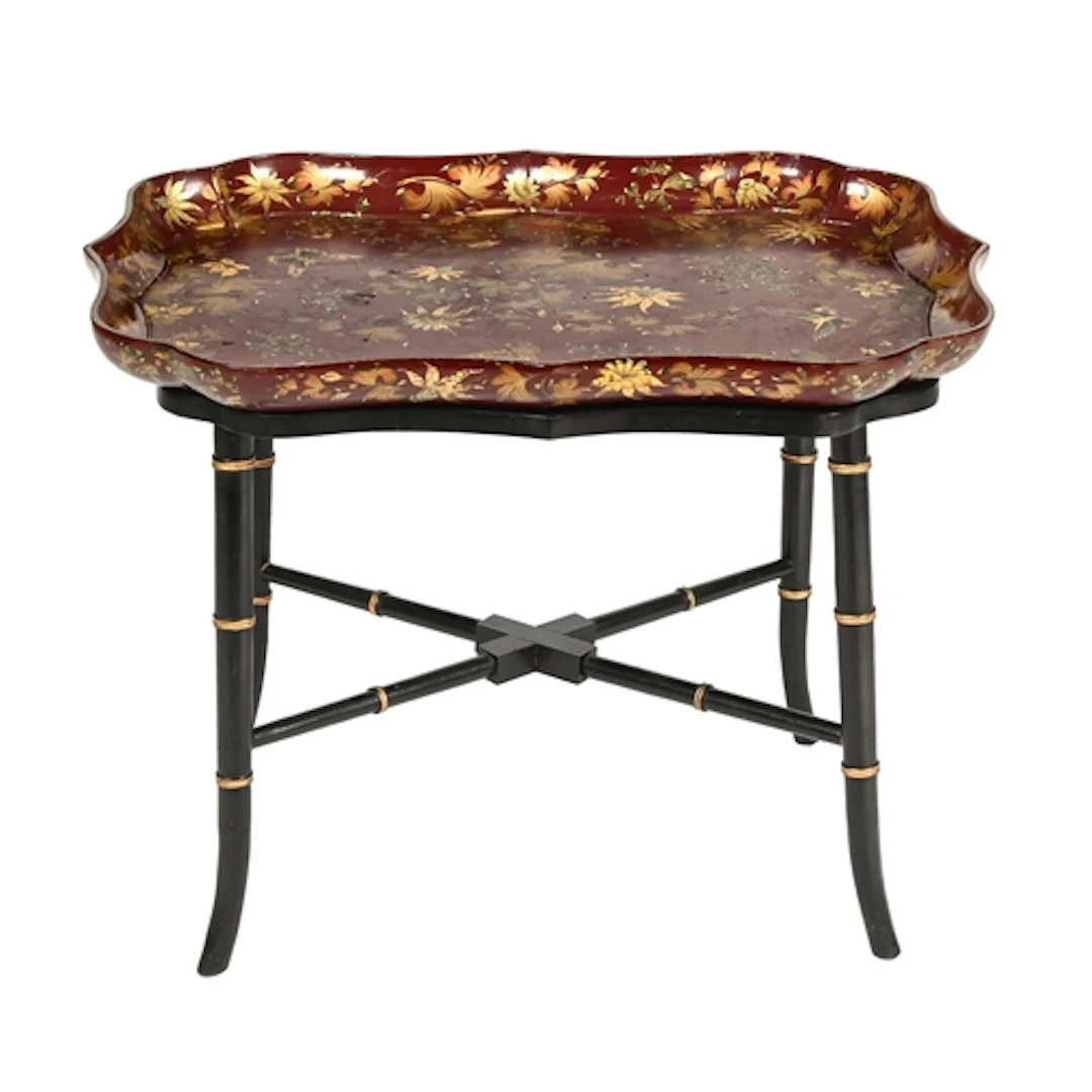 A Victorian polychrome chocolate ground papier mache tea tra...