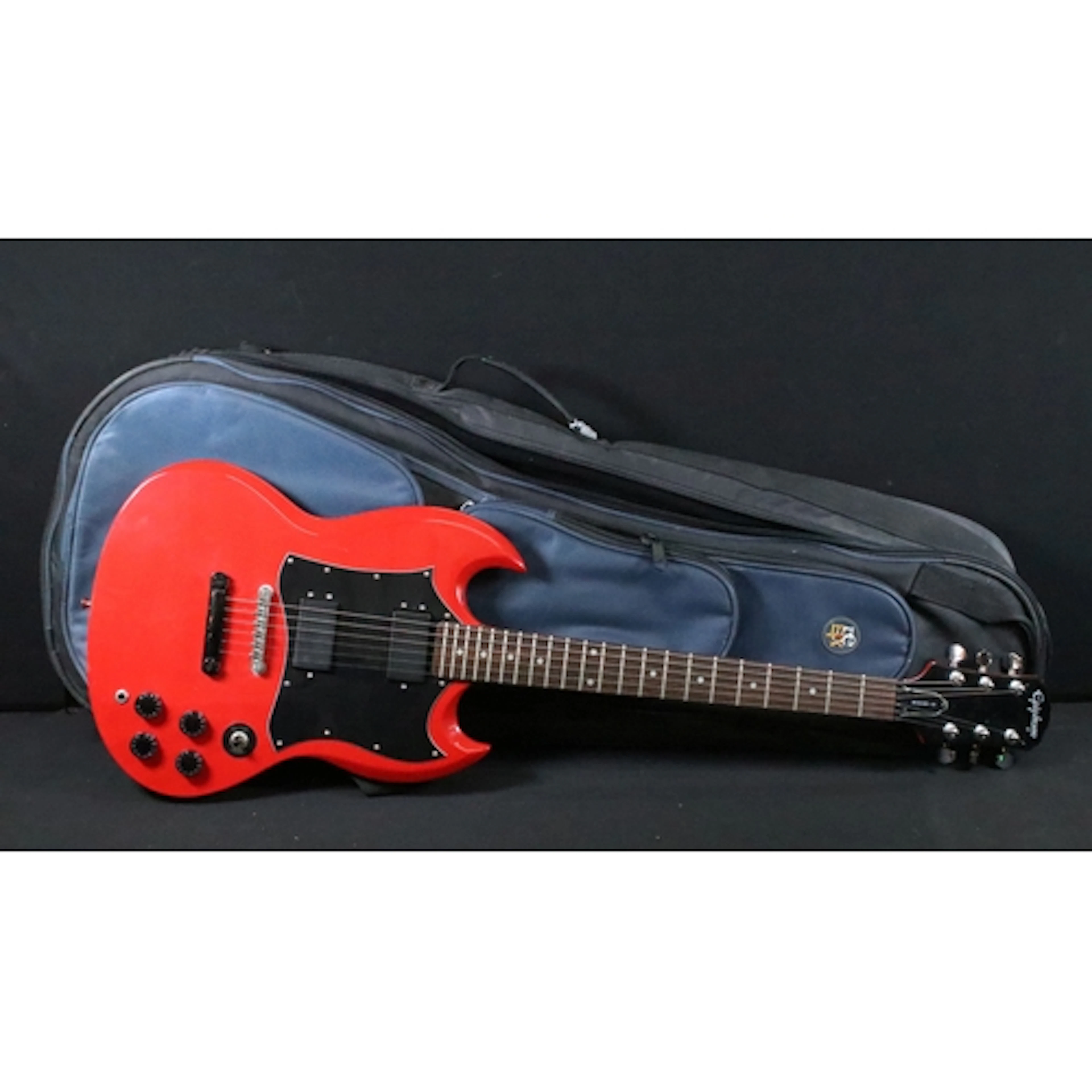 Guitar - Circa late 90's Epiphone SG in red with Gibson to t...