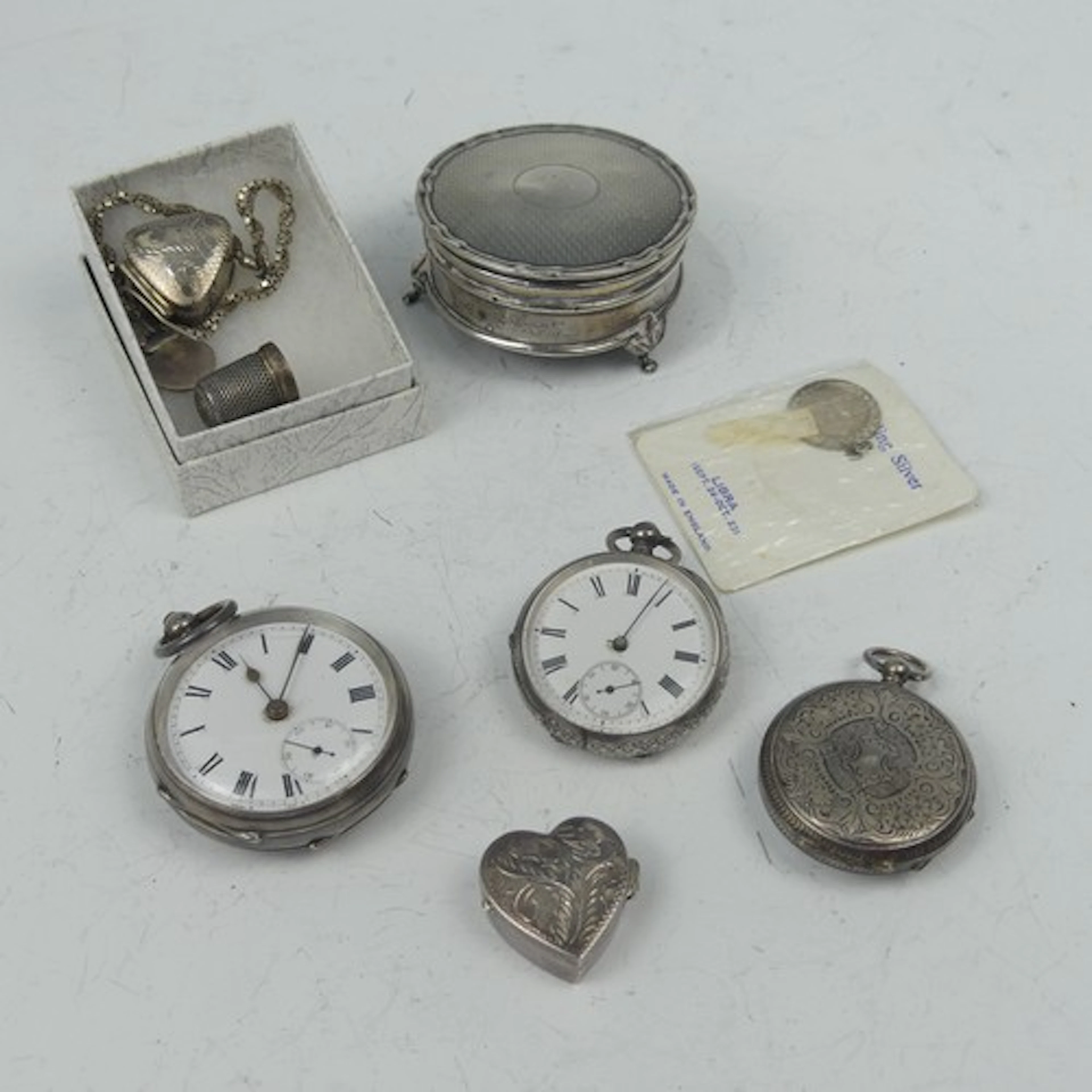 A George V silver Ring Box,of circular form with engine turn...