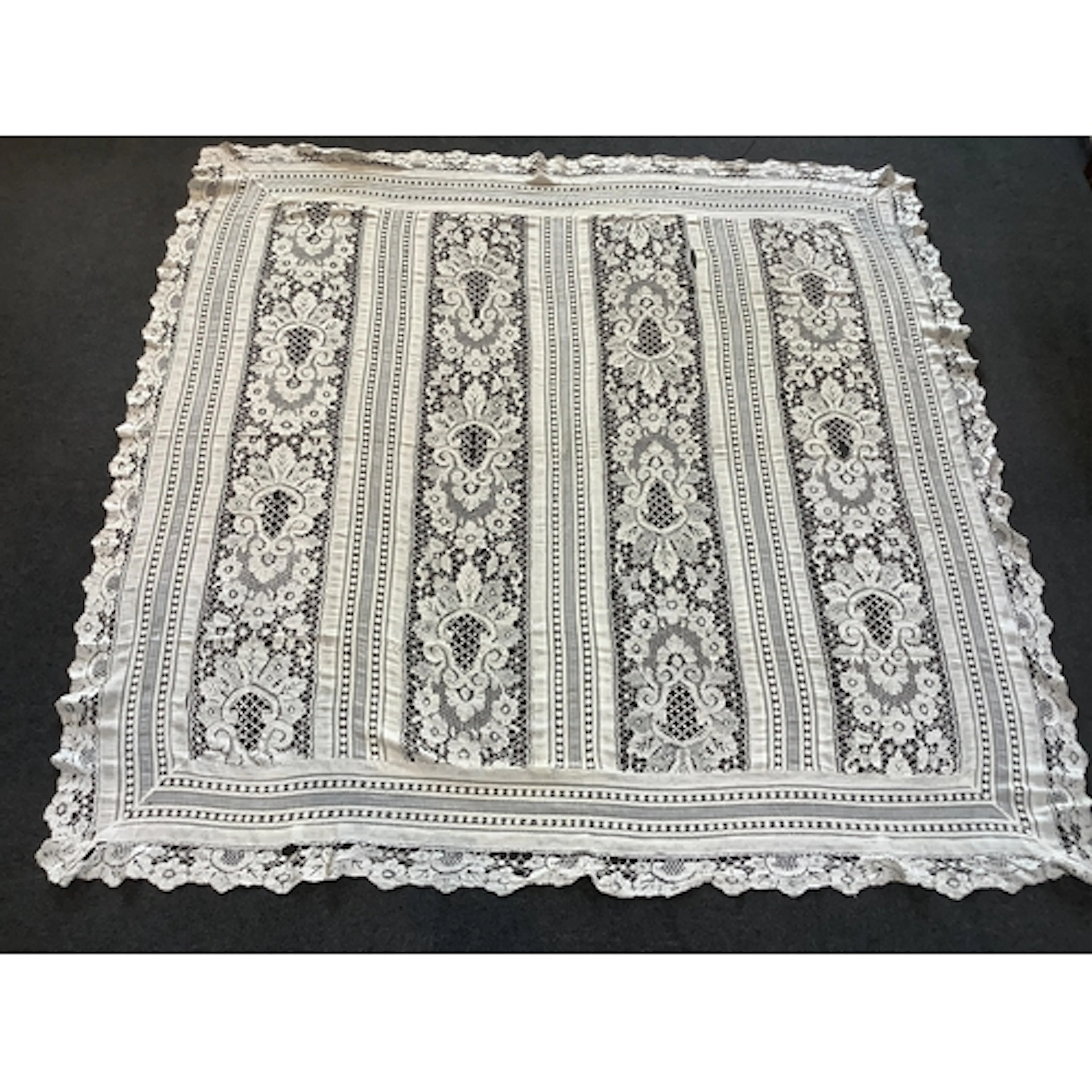 An early 20th century continental cream hand bobbin lace and...