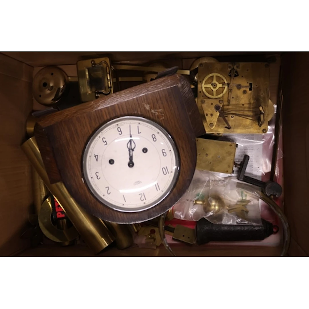 Mantel clock and spare clock parts.