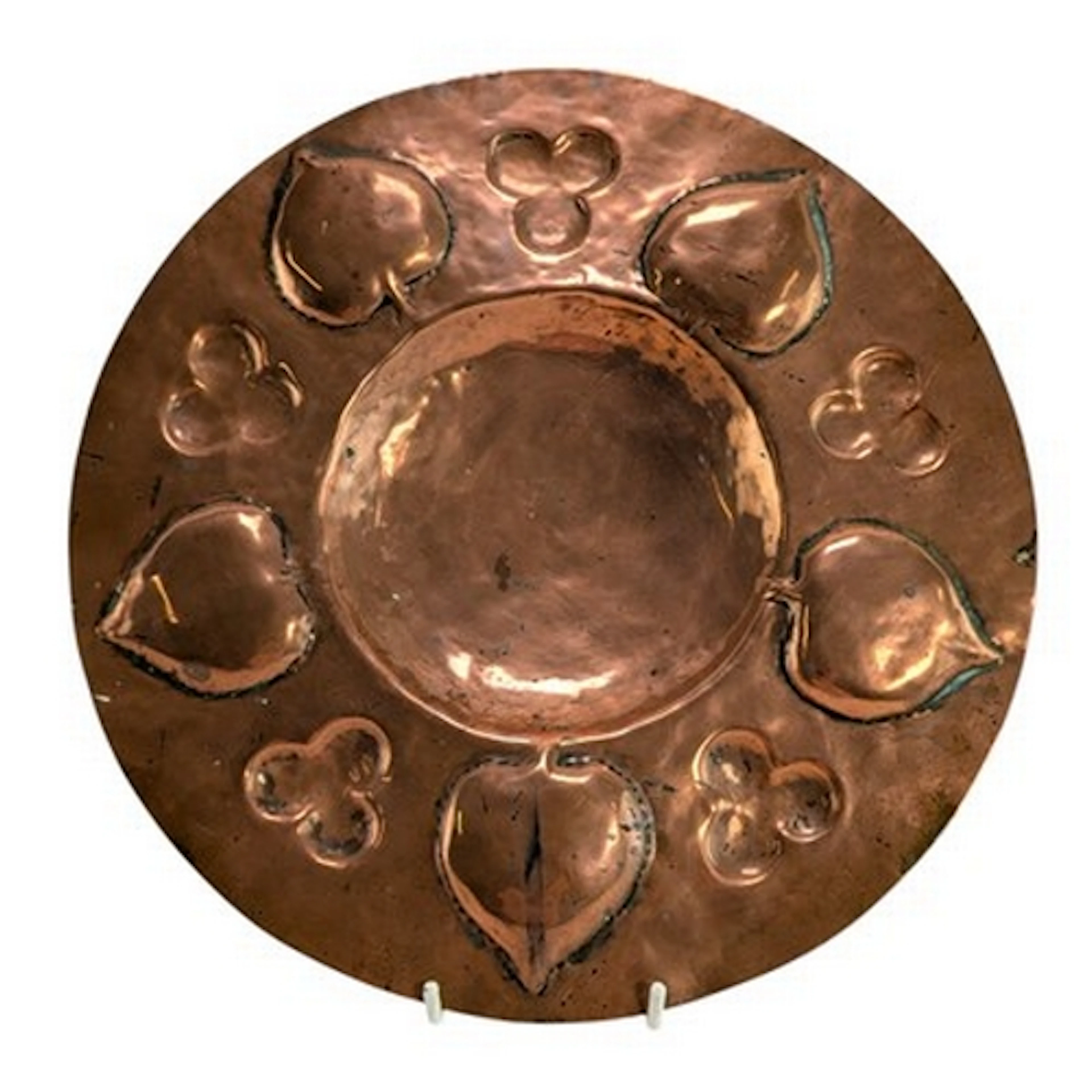 An early 20th century Arts and Crafts hammered copper card t...
