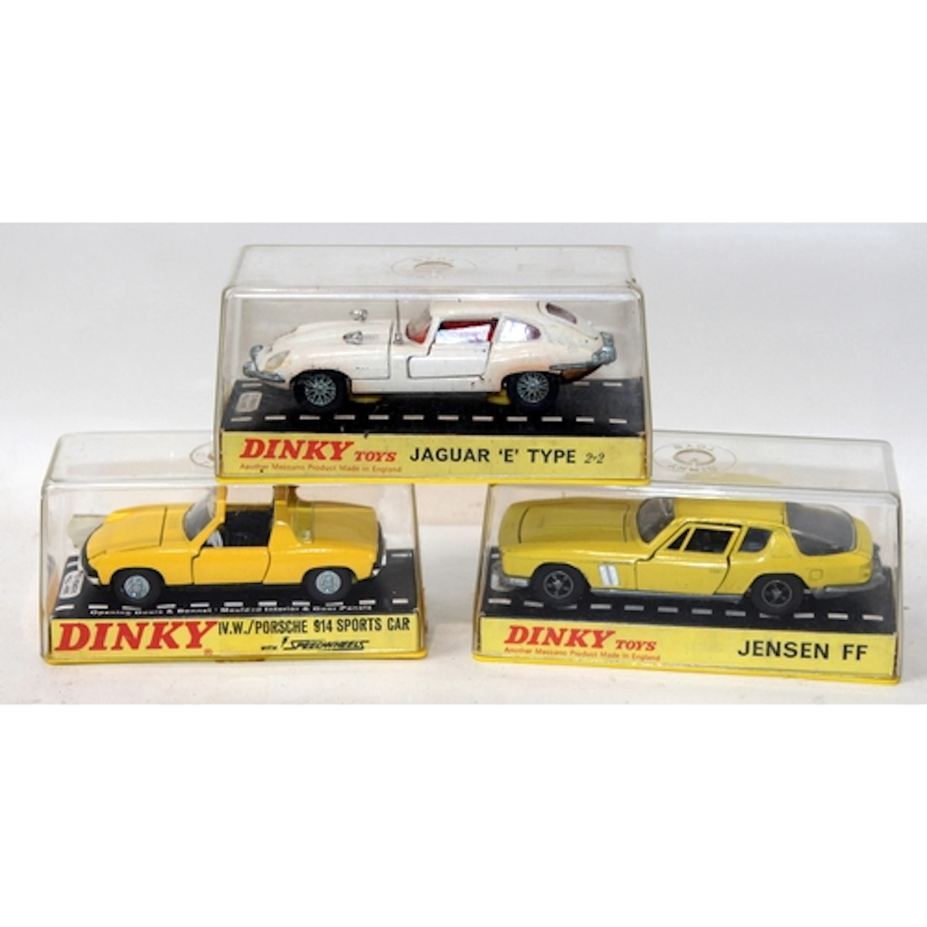 Vintage Dinky die-cast model vehicles in original perspex ca...