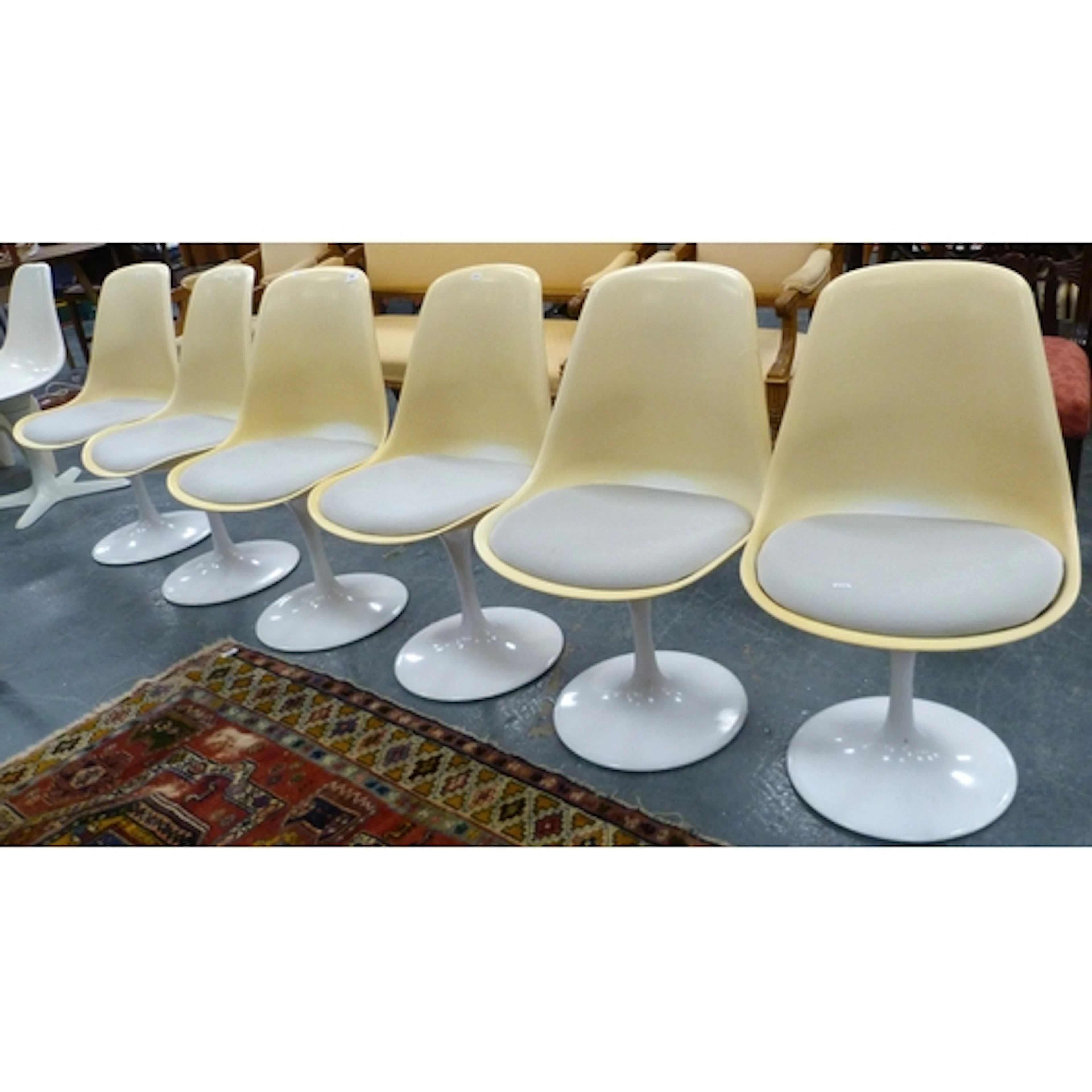 Set of six Tulip Arkana style swivel chairs.