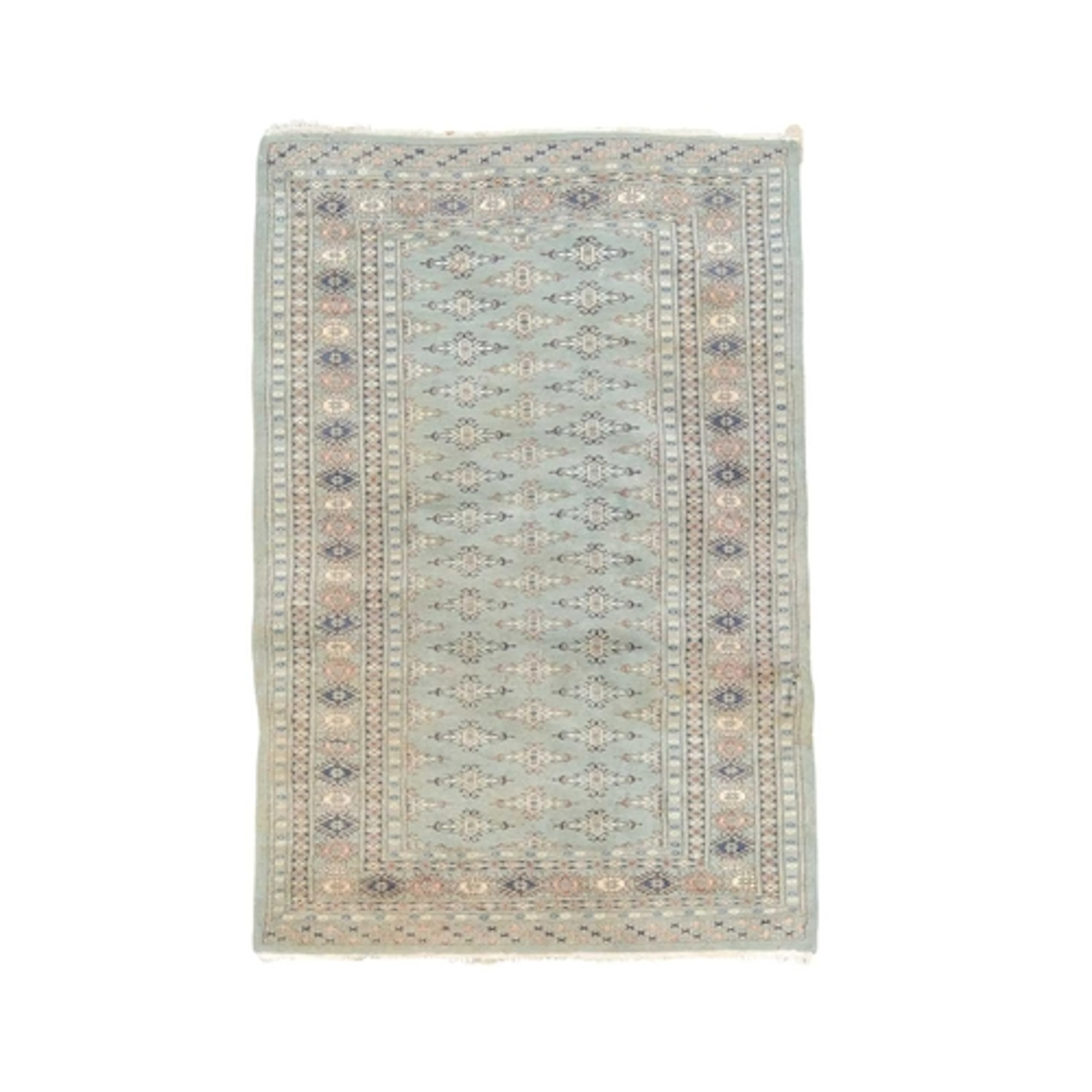 A hand knotted Pakistan Bokhara rug. The blue field decorate...
