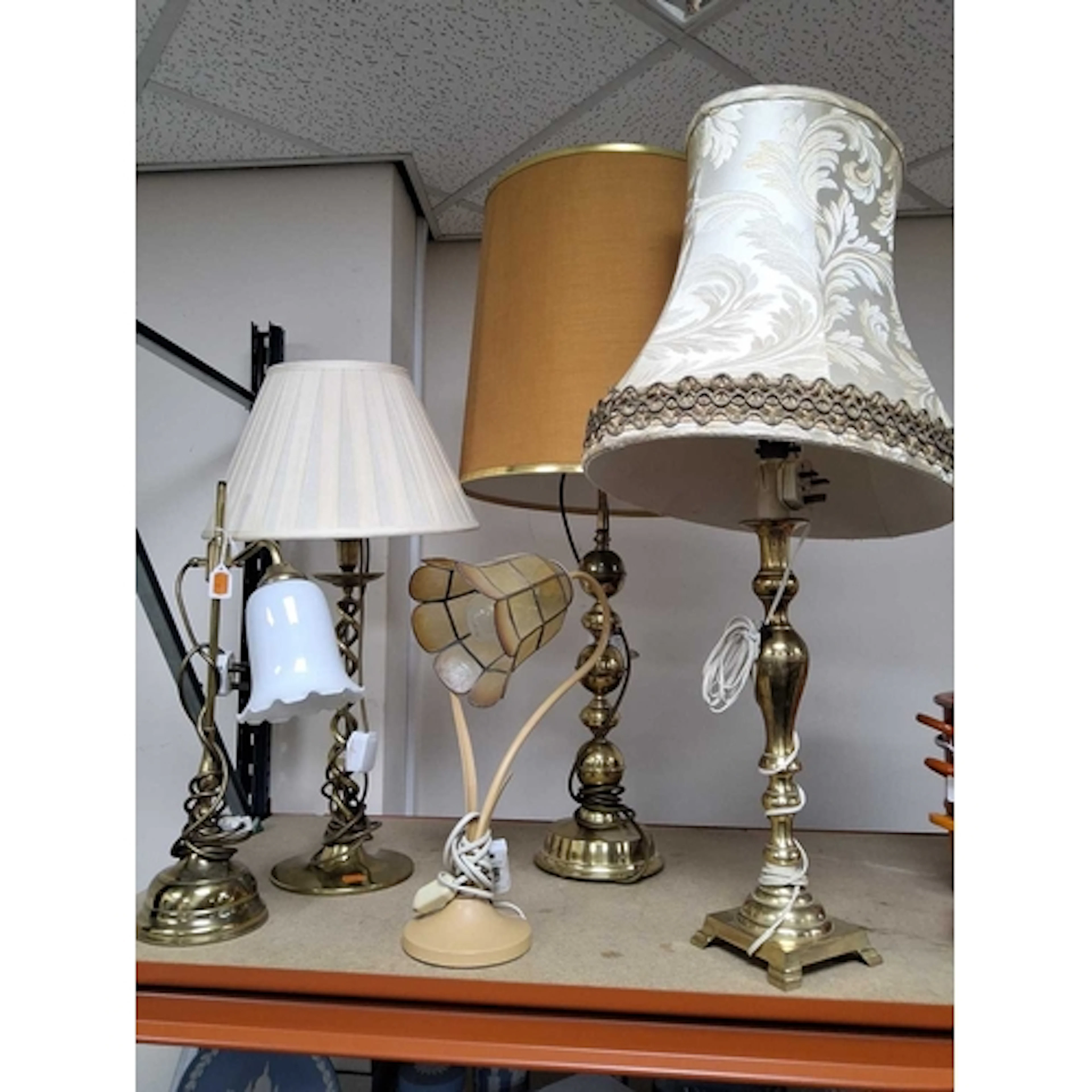 A GROUP OF FIVE TABLE LAMPS comprising a double spiral brass...