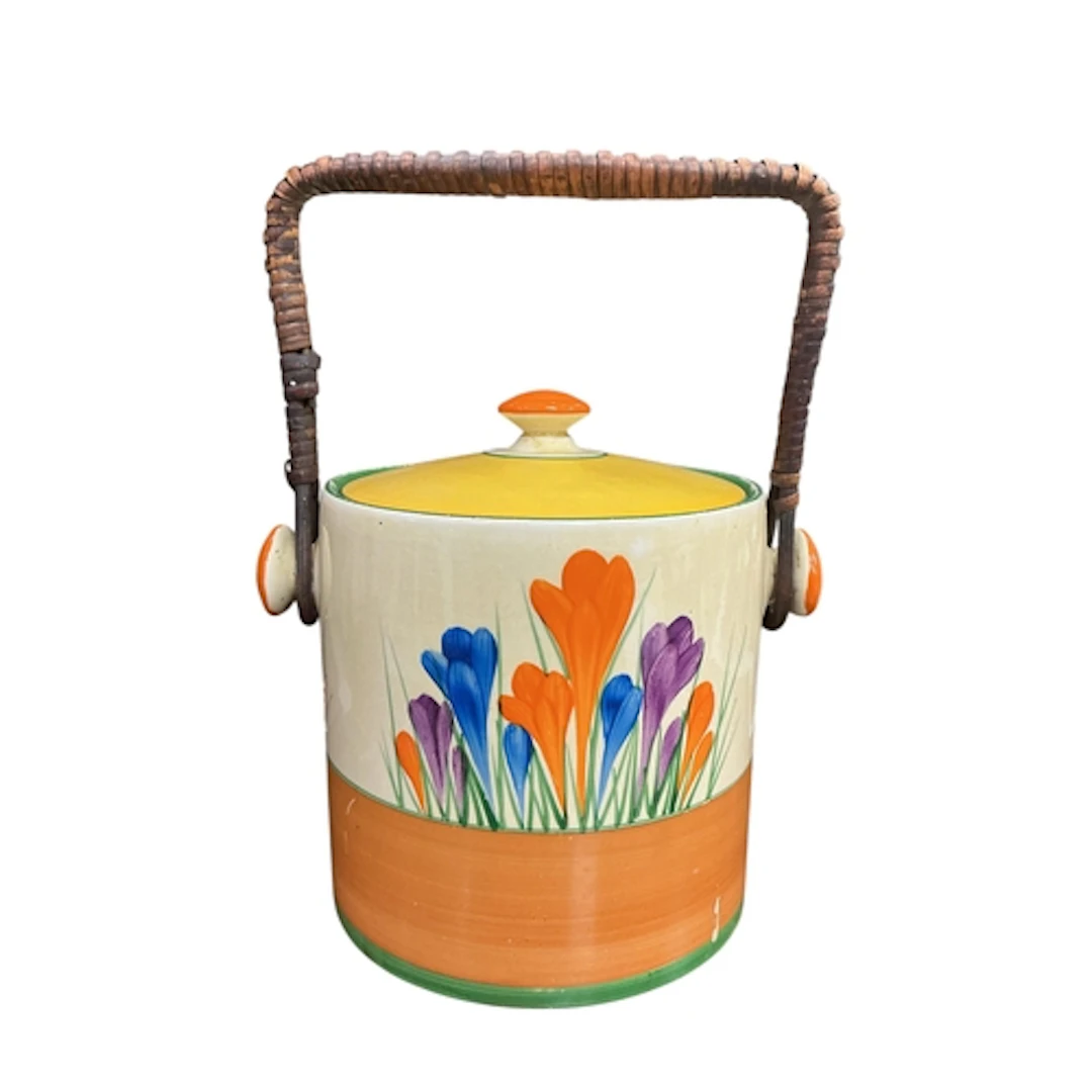 A Clarice Cliff Bizarre Crocus pattern biscuit barrel and co...