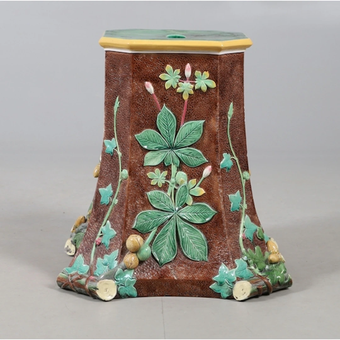 19THC MAJOLICA GARDEN STOOL/JARDINIERE STAND. A majolica pot...