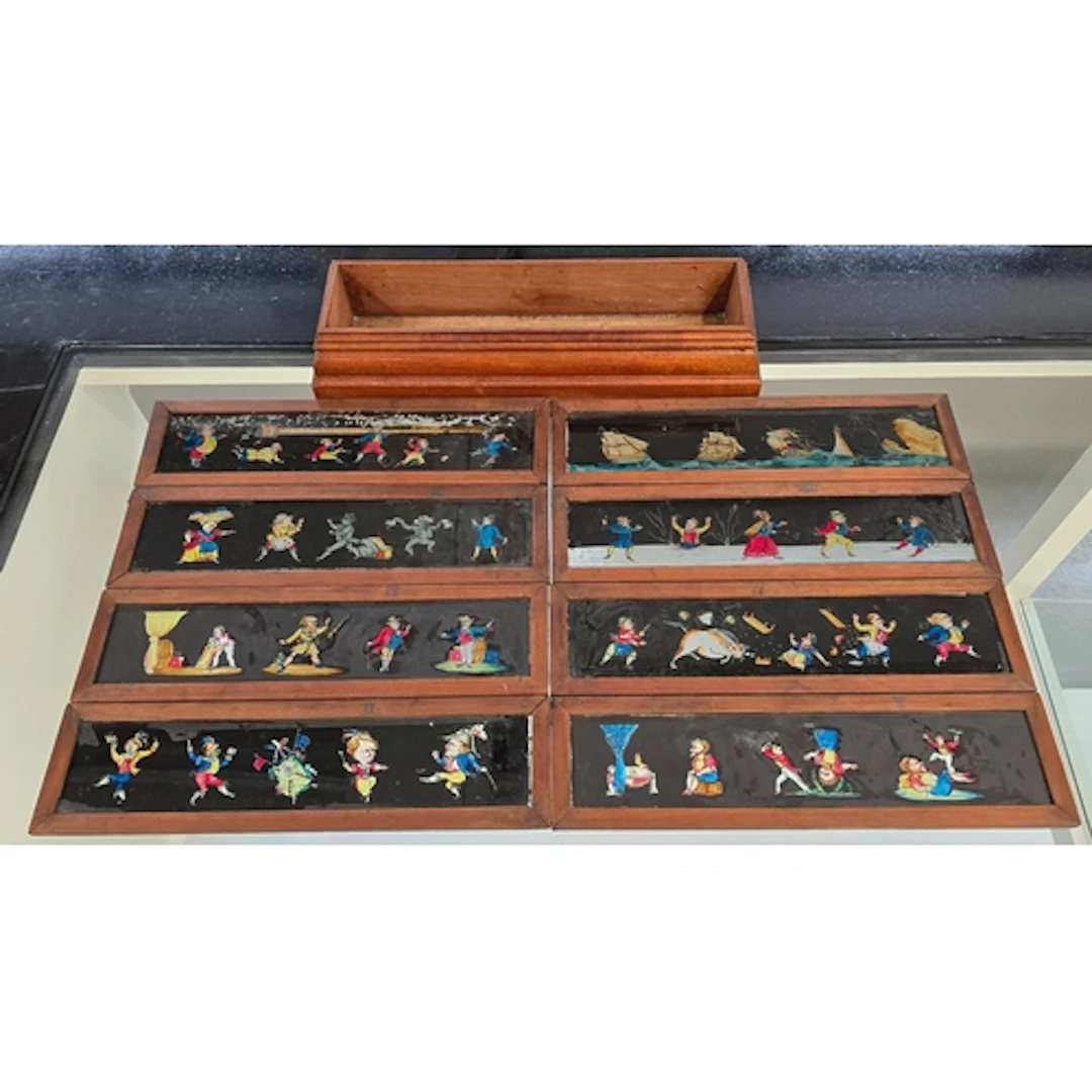 A quantity of eight antique Victorian magic lantern nursery ...