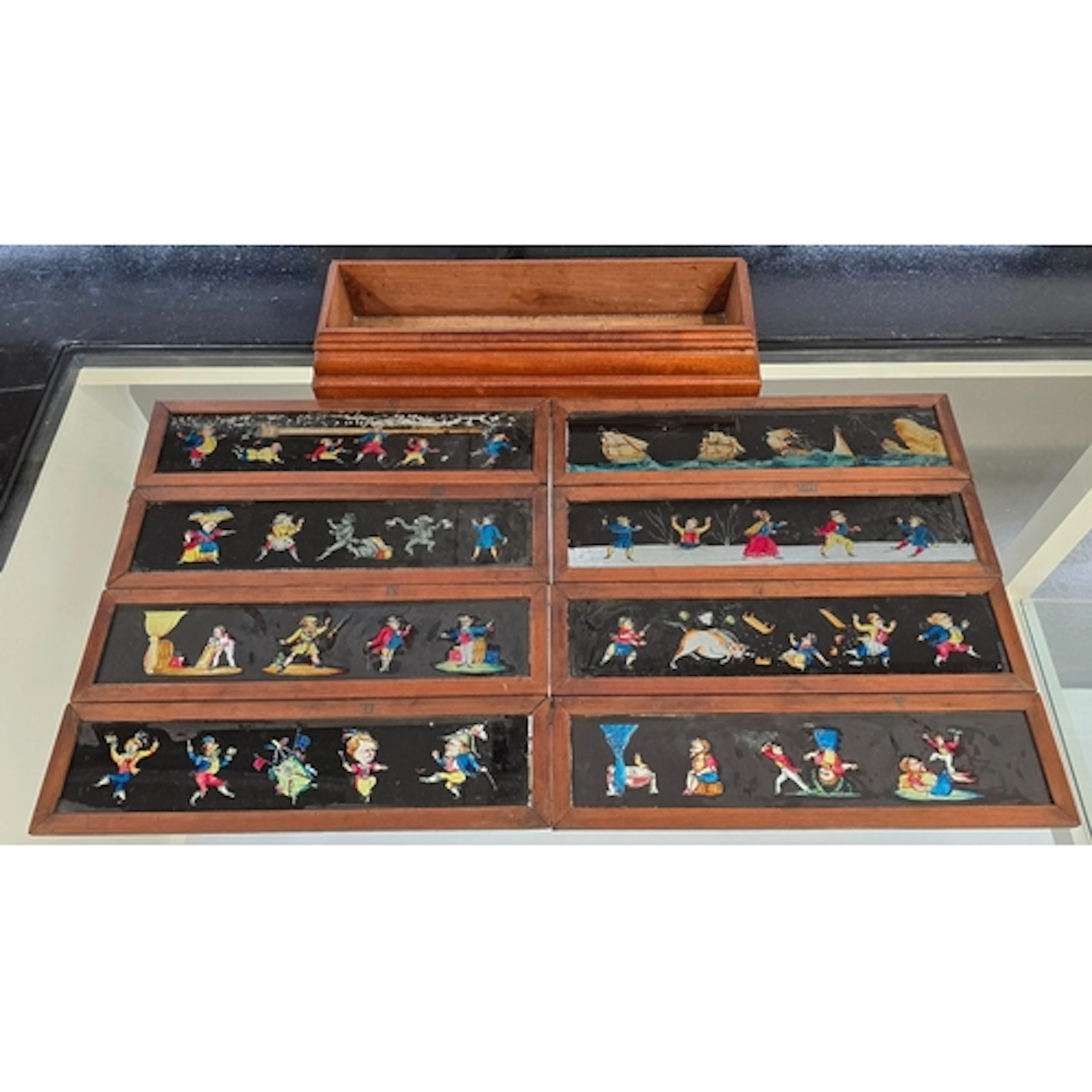 A quantity of eight antique Victorian magic lantern nursery ...
