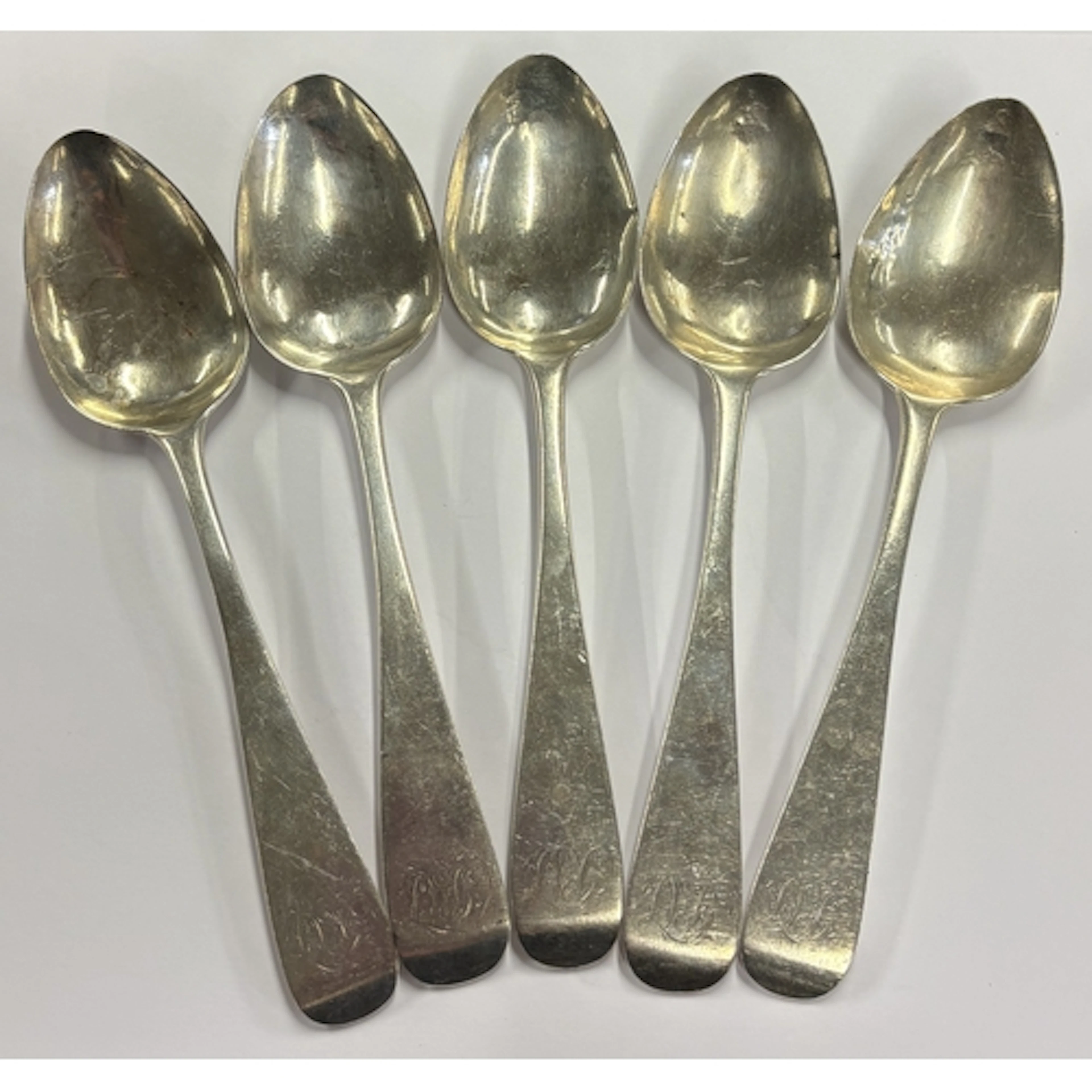 A matched set of five Georgian silver spoons. London. By GR....