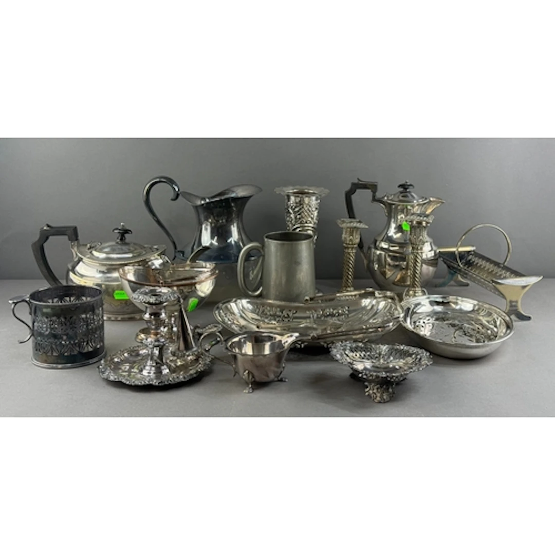 Silver Plate: a pair of spiral candlesticks with square base...