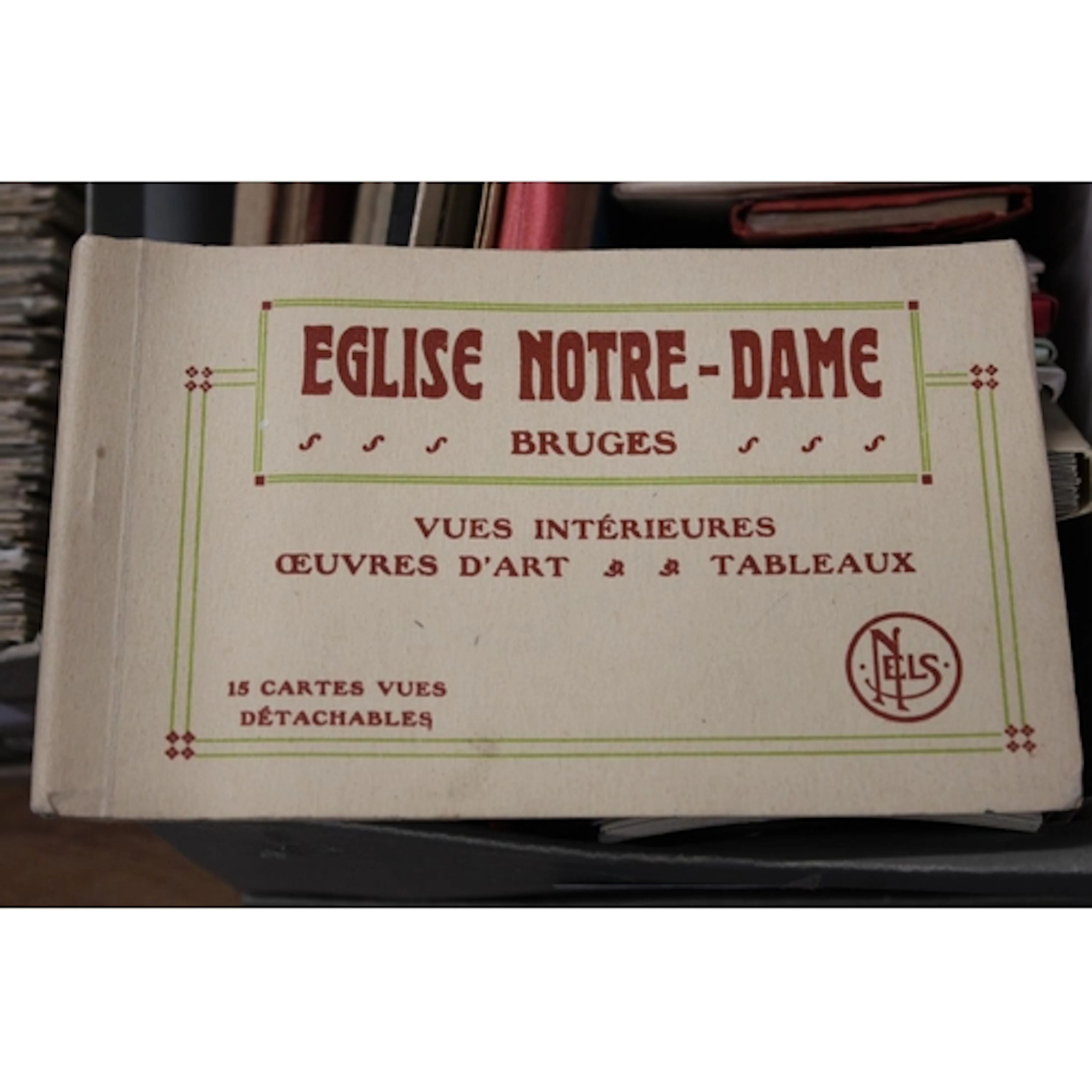 Shoebox containing picture postcard booklets to include Alge...