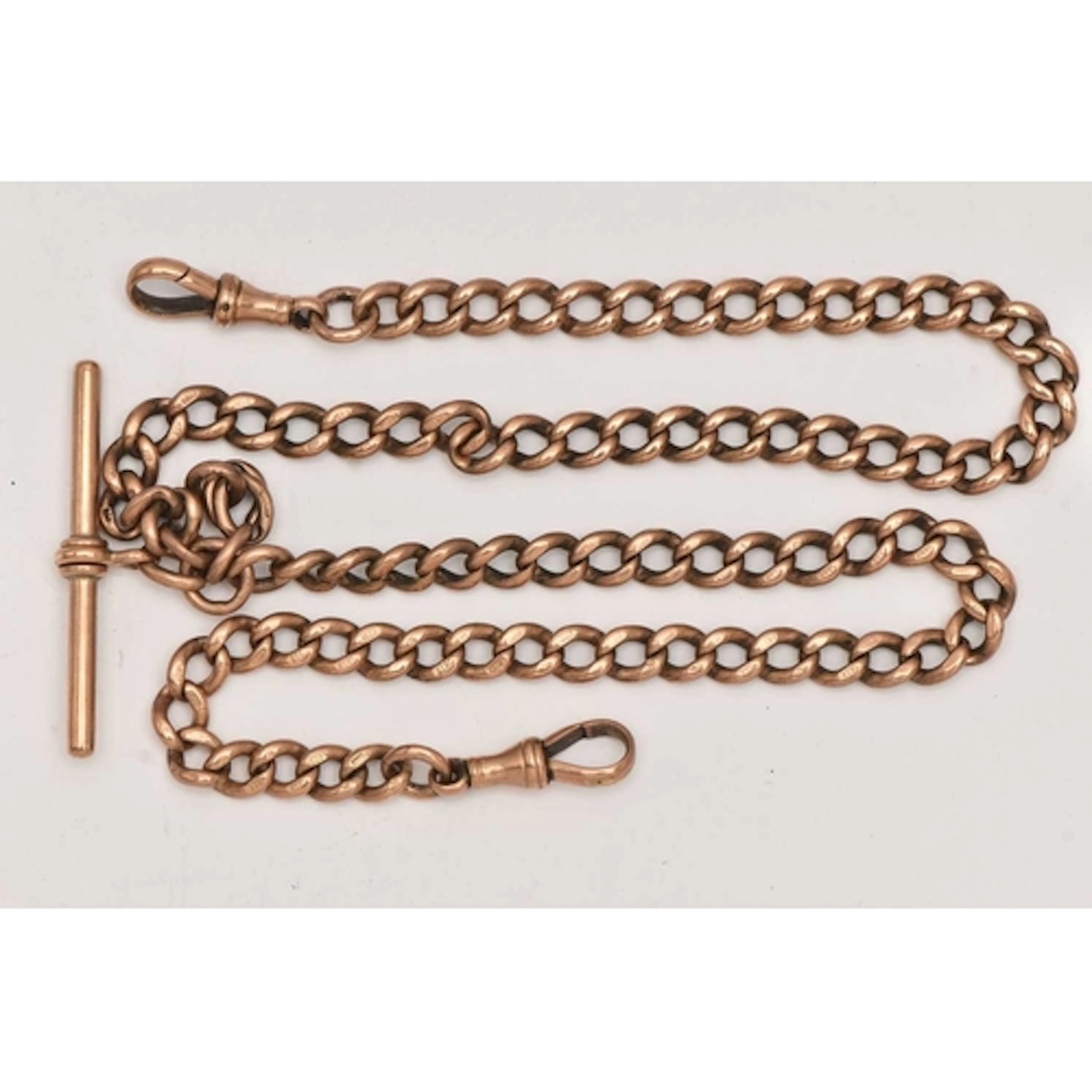 A 9CT GOLD DOUBLE ALBERT CHAIN, graduated curb links, links ...