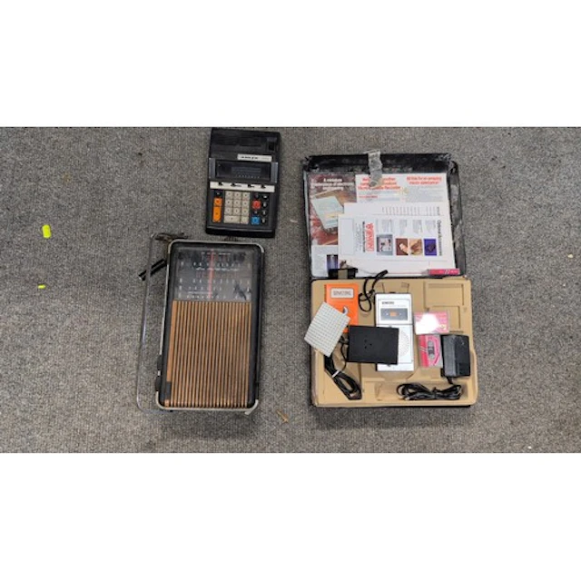 A group of vintage electronics comprising a Bush BW5777A por...
