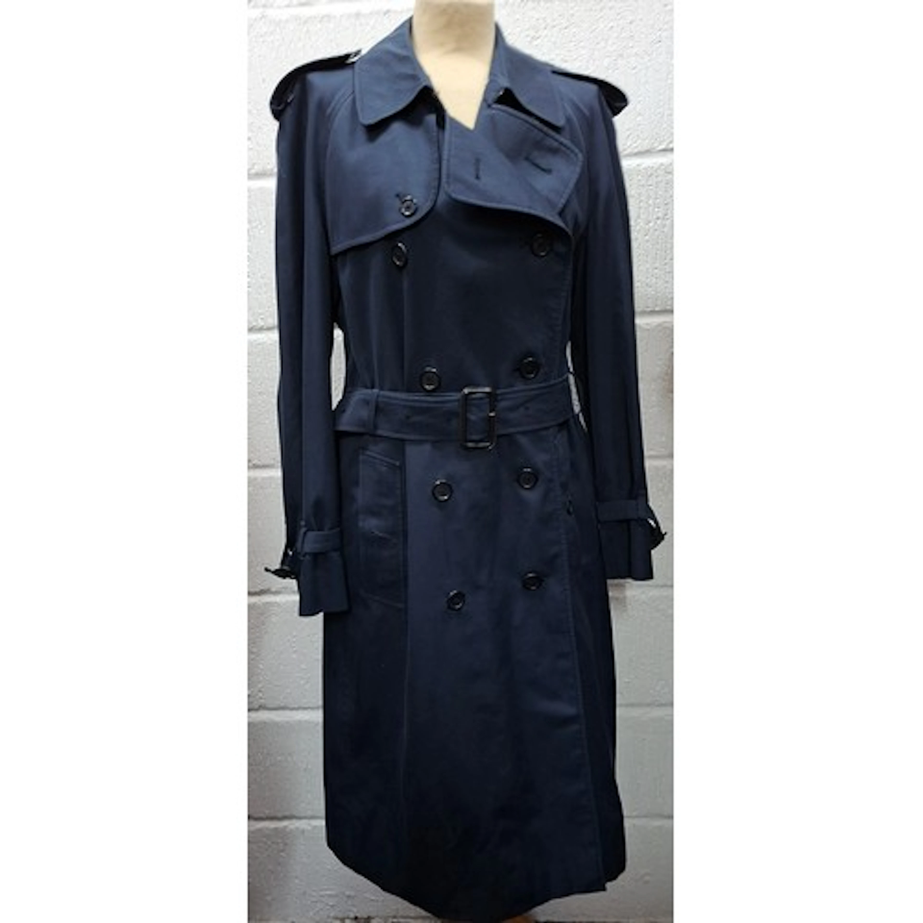 Burberrys- A late 20th Century navy trench coat having a bel...