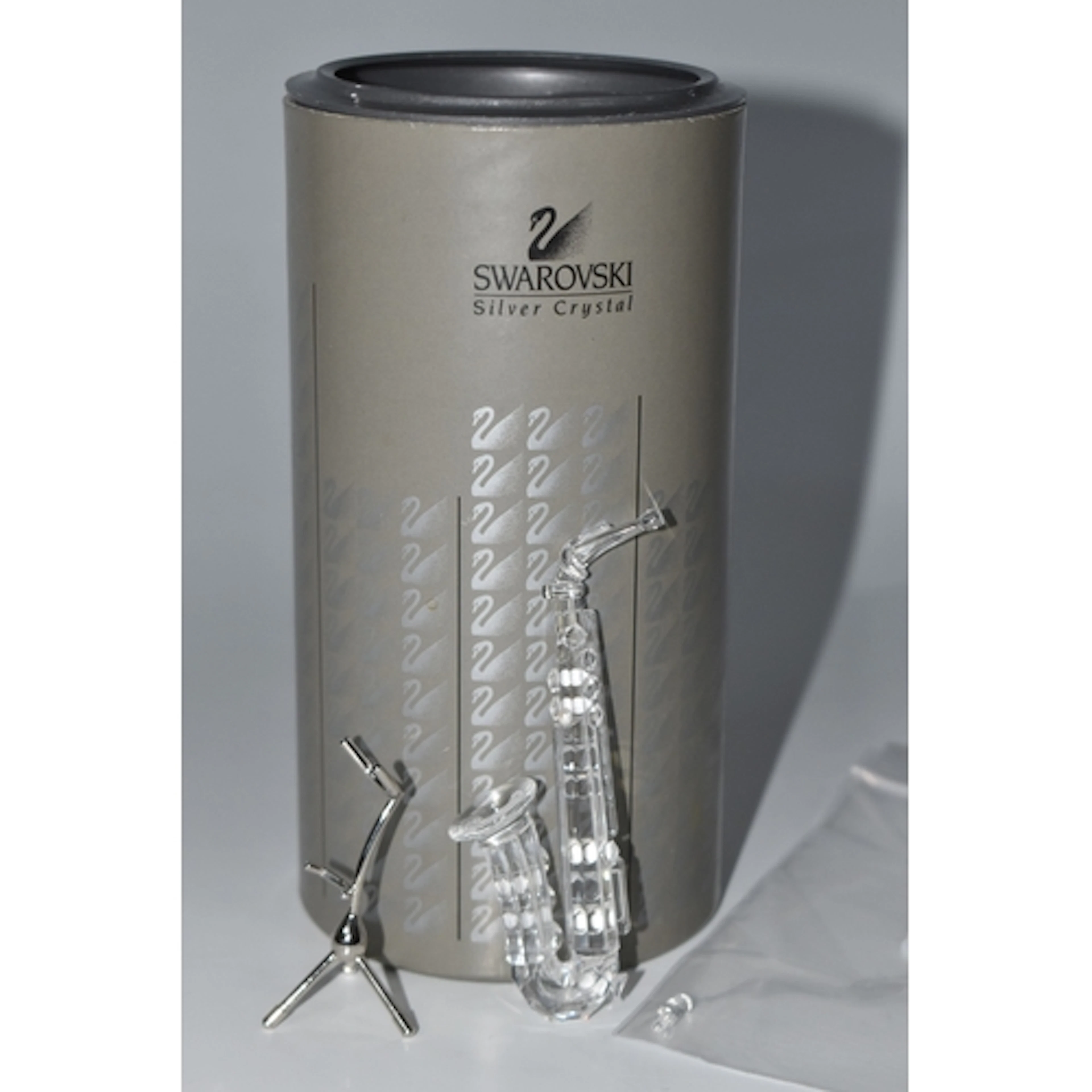 A SWAROVSKI SCULPTURE, Saxophone No. 211728 with stand and b...