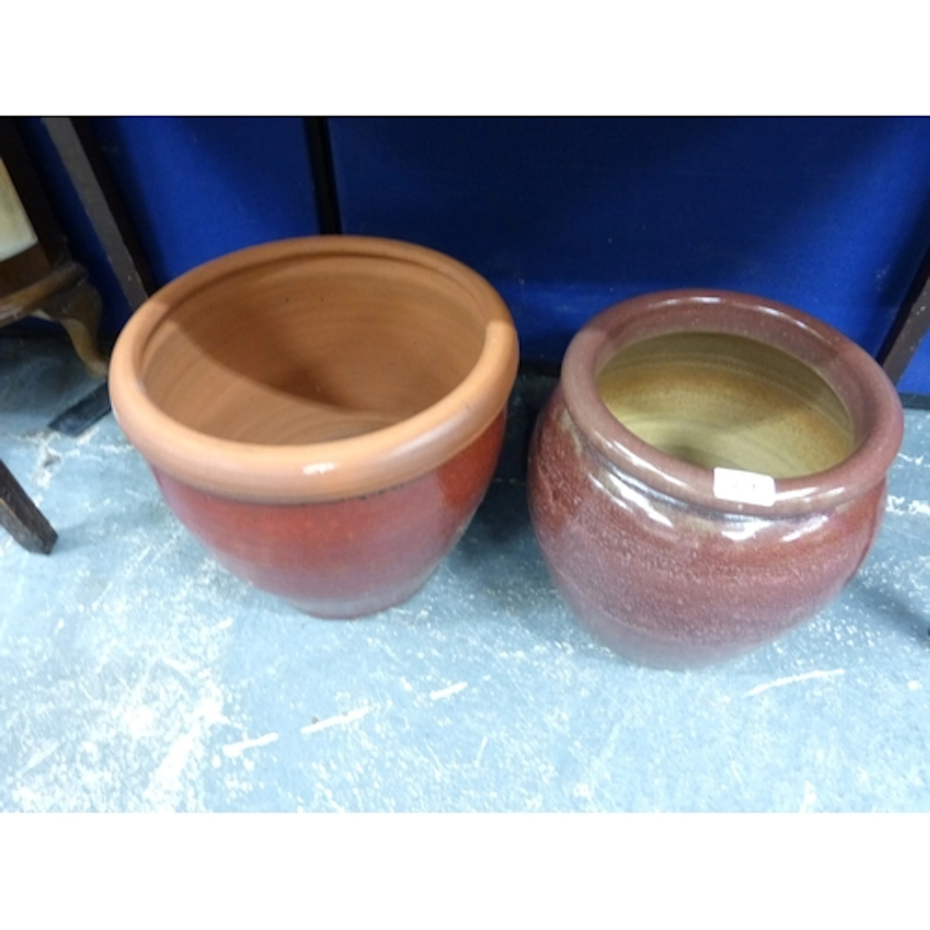 Two modern garden ceramic planters.