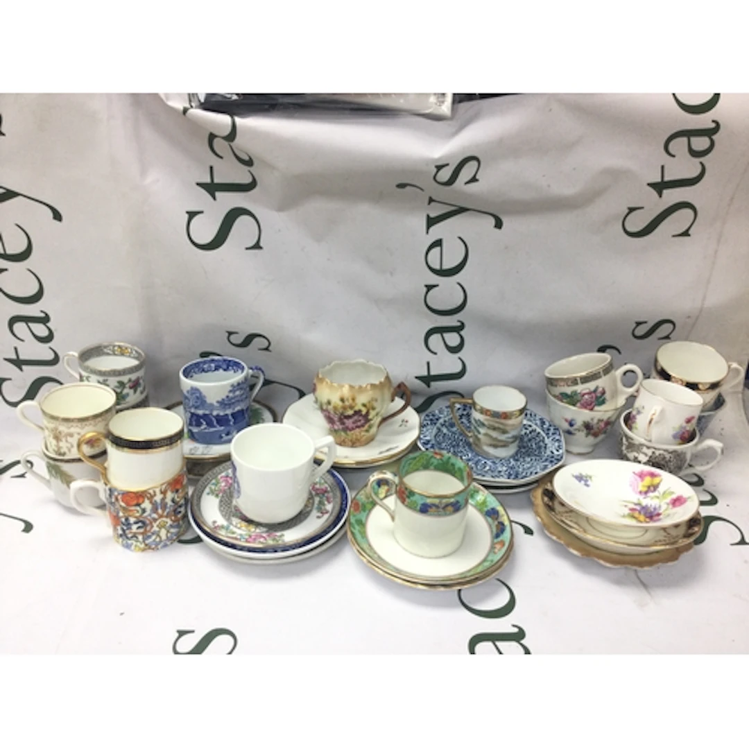 A collection of cups and saucers featuring a wide variety of...