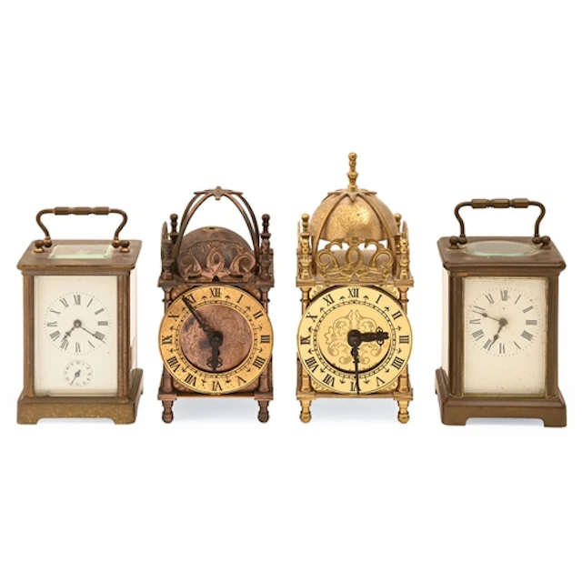 A French brass carriage clock, early 20th c, the enamel dial...