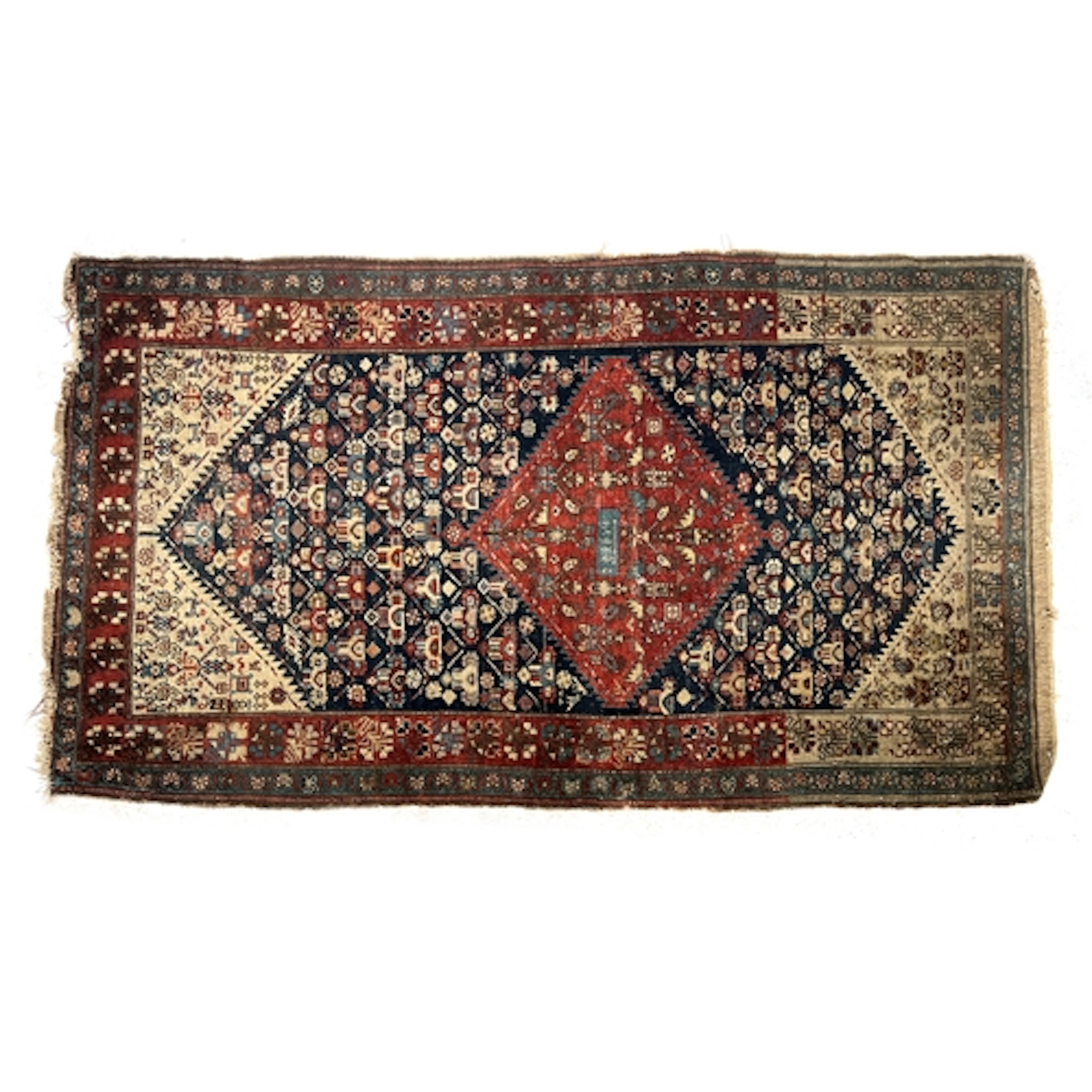 A small Persian rug, possibly Qashqai, with central serrated...