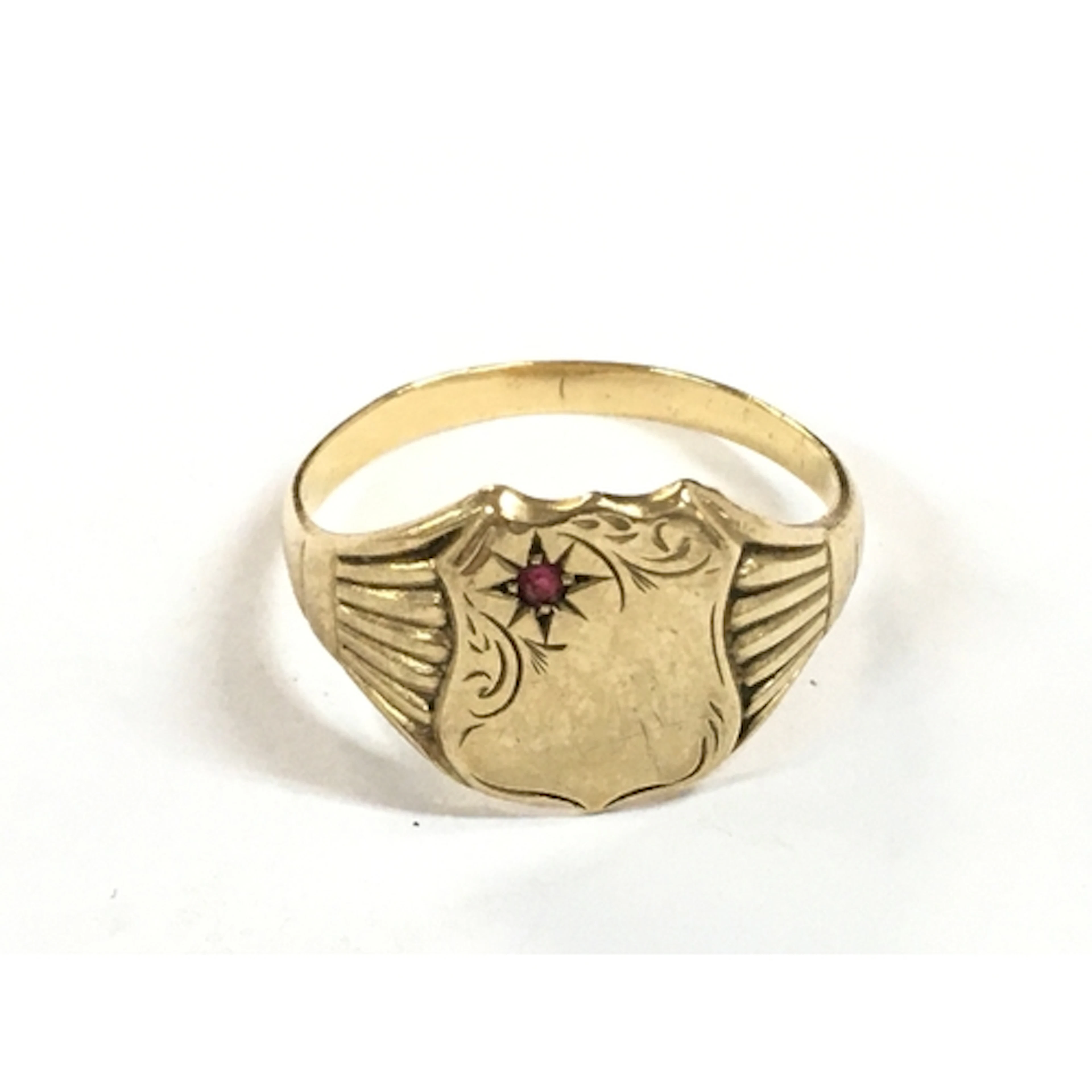 A 9ct gold gents ring, size X.5.6g