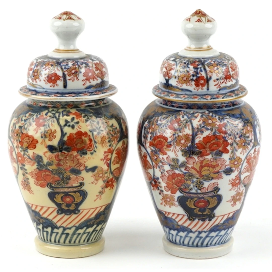 Pair of Japanese Imari porcelain vases and covers hand paint...