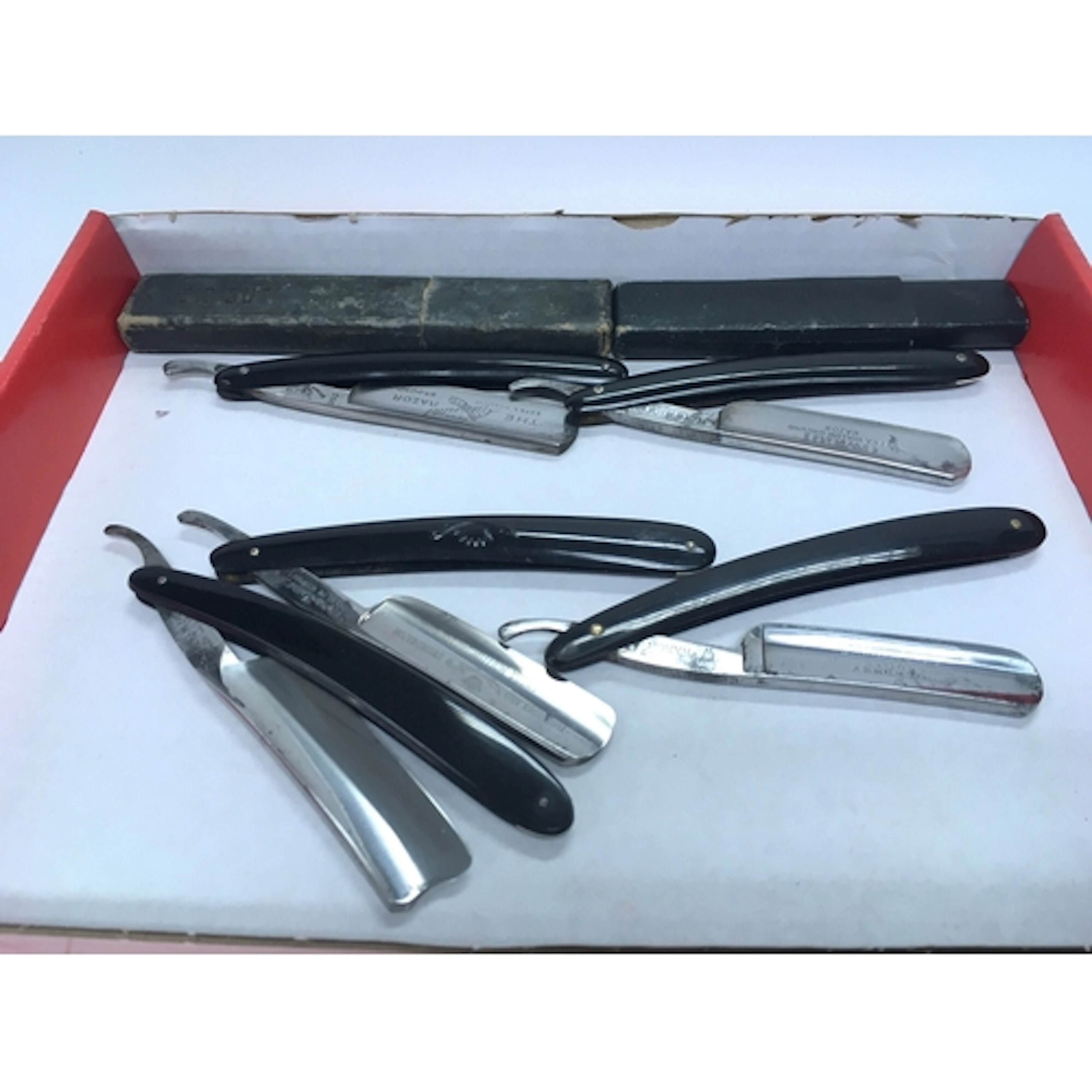 Five vintage straight razors , Crown x sword, the gauntlet r...
