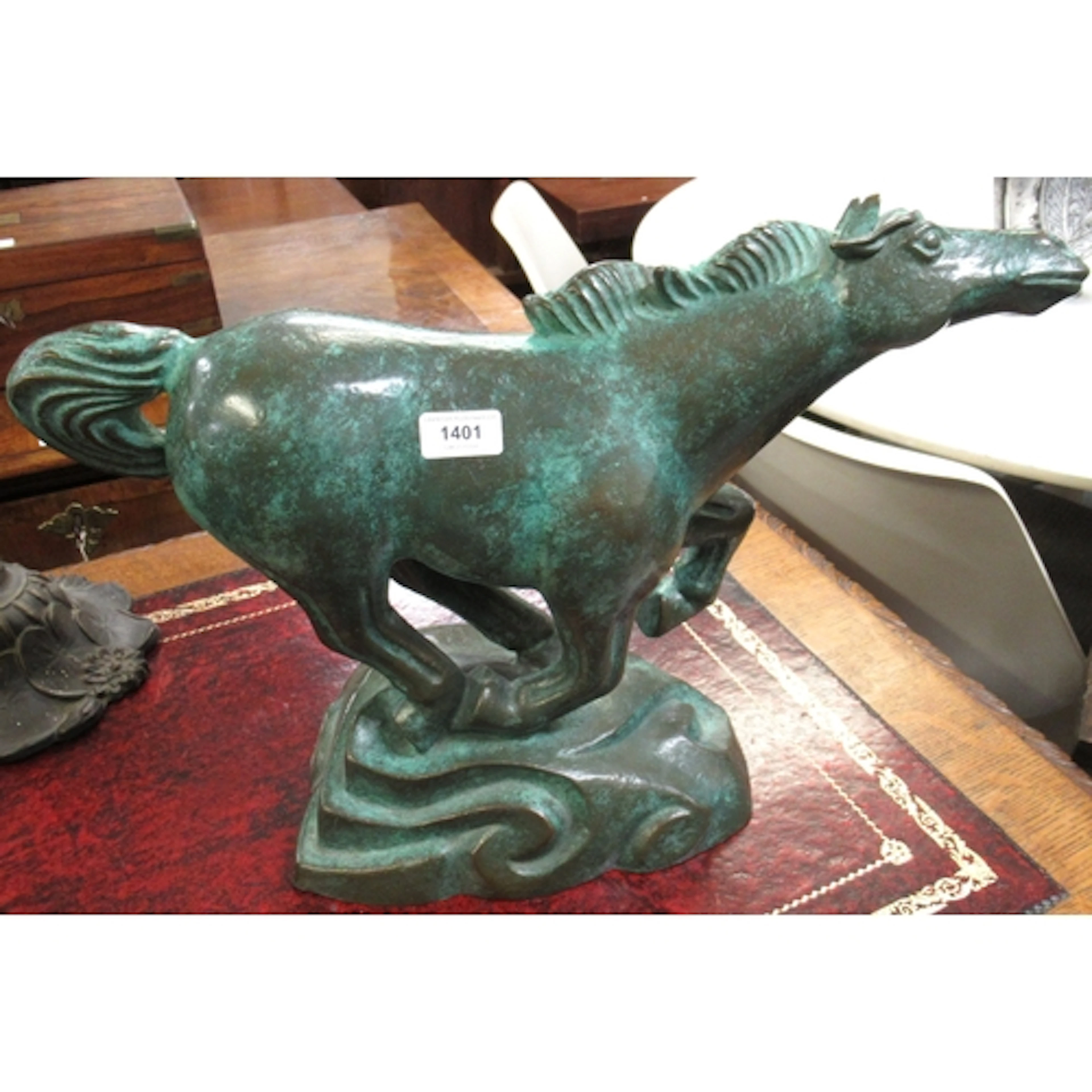Chinese green patinated bronze figure of a horse, 53cm wide ...